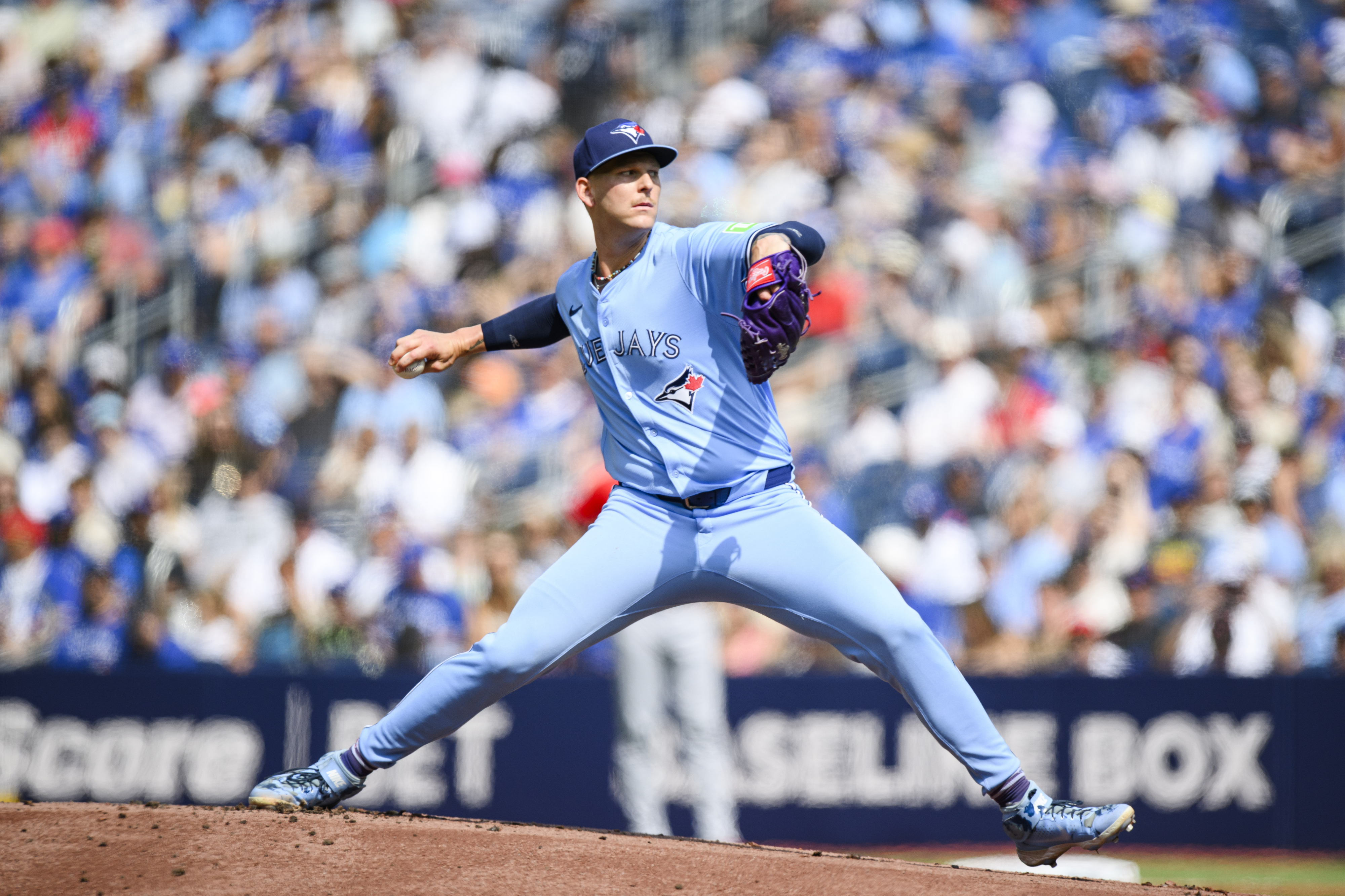 Toronto Blue Jays pitcher Bowden Francis throws the ball during the first inning of a baseball game against the Los Angeles Angels in Toronto, Saturday, Aug. 24, 2024.