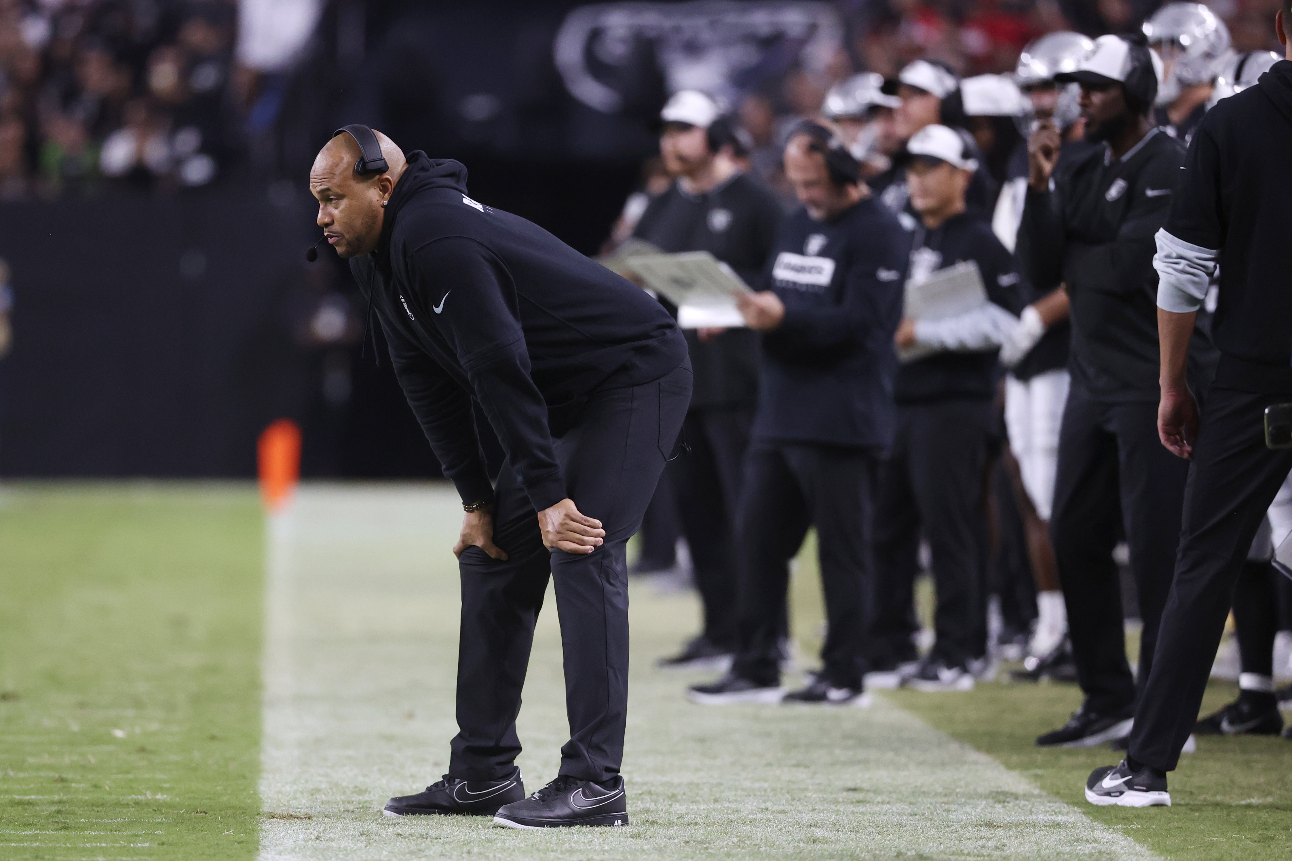 Las Vegas Raiders head coach Antonio Pierce watches from the sidelines during the first half of an NFL preseason football game against the San Francisco 49ers, Friday, Aug. 23, 2024, in Las Vegas. 