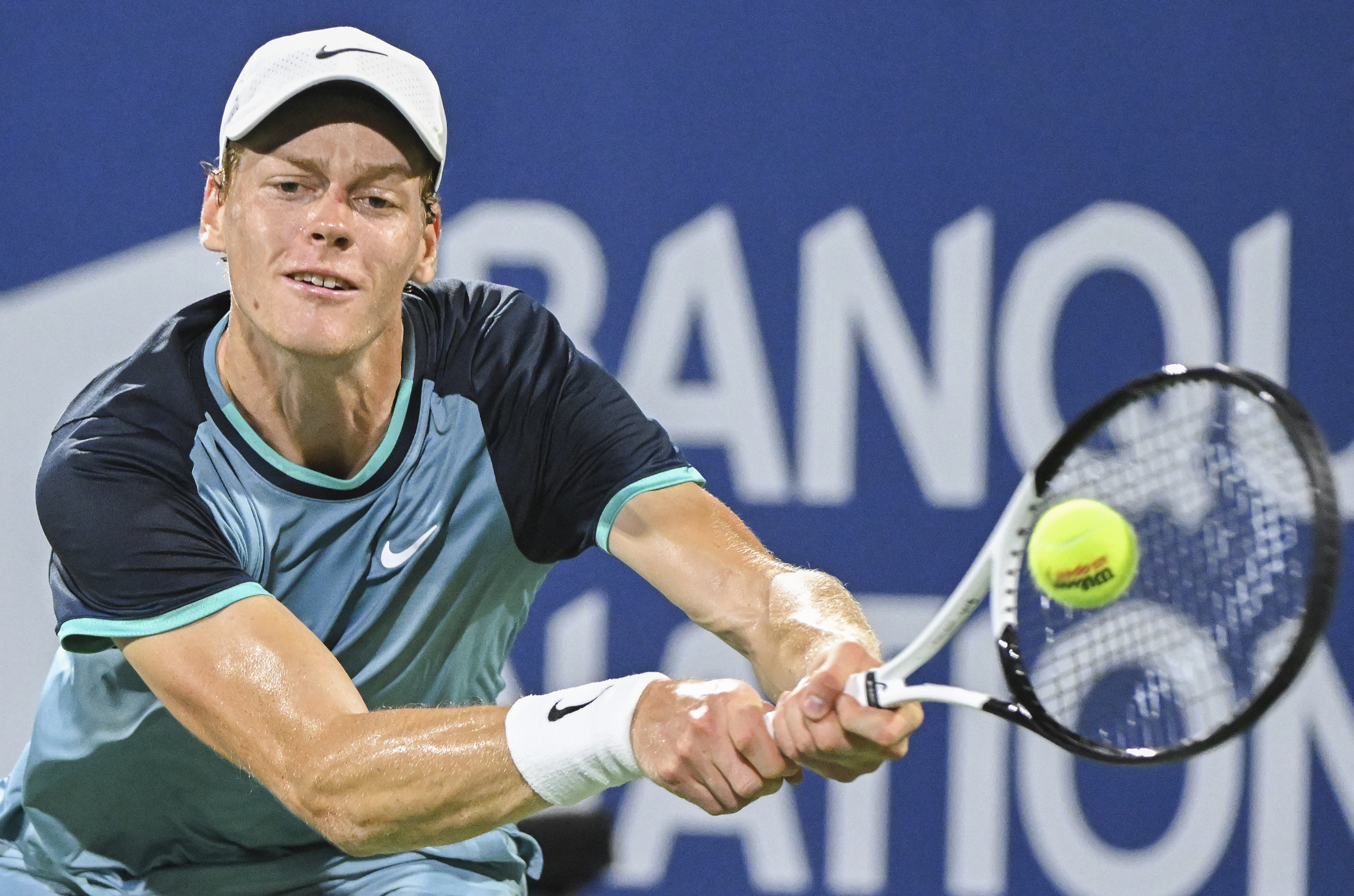 Jannik Sinner, of Italy, plays a shot to Andrey Rublev, of Russia, during their quarterfinal match at the National Bank Open tennis tournament in Montreal, Saturday, Aug. 10, 2024. 