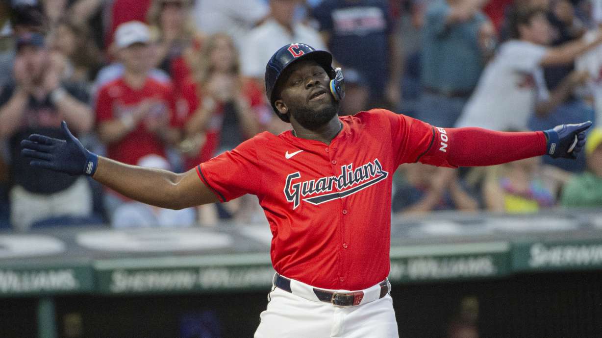 Cleveland Guardians' Jhonkensy Noel celebrates after hitting a three-run home run off Texas Rangers starting pitcher Jon Gray during the third inning of a baseball game in Cleveland, Saturday, Aug. 24, 2024.