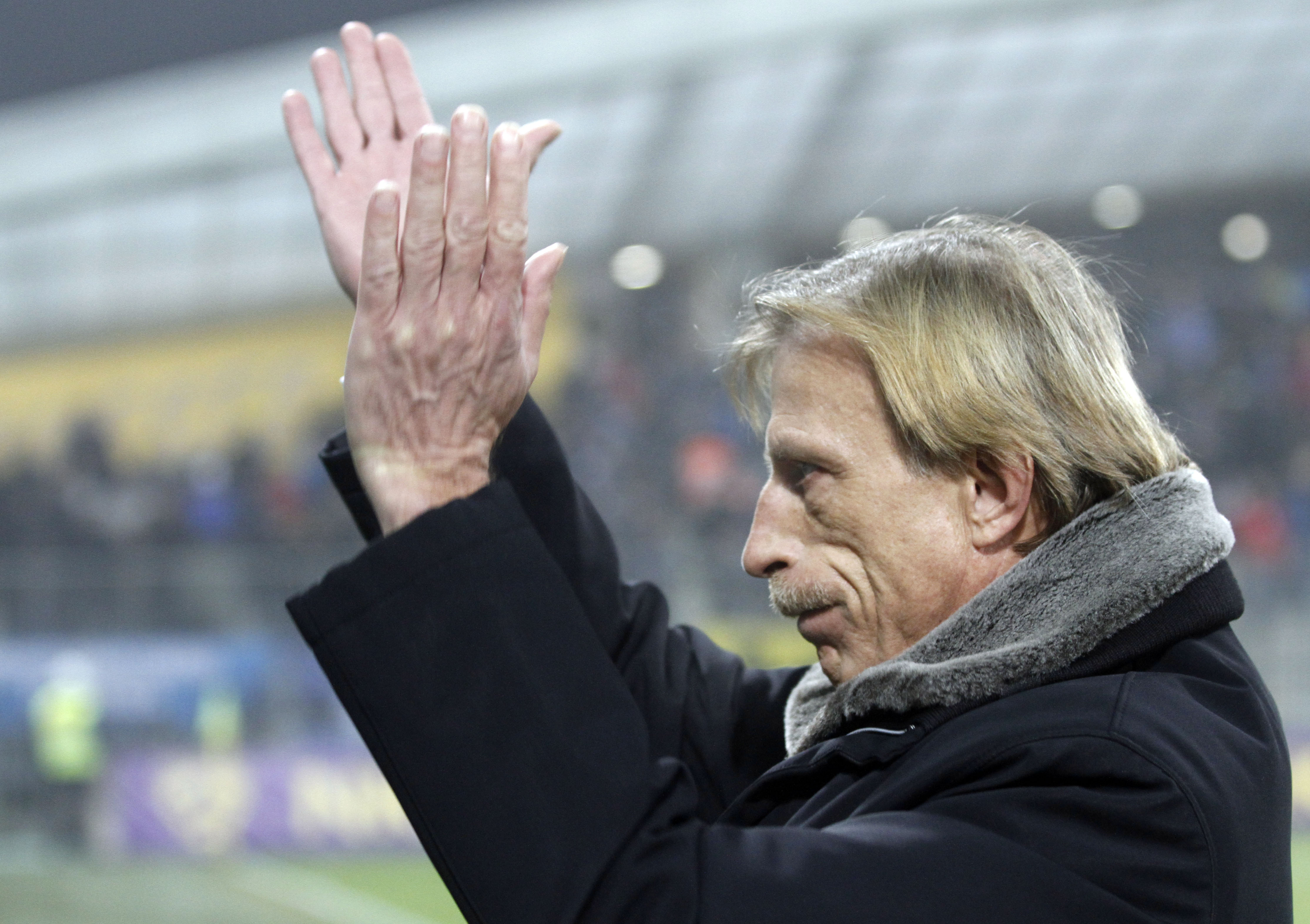 FILE - Club Brugge's coach Christoph Daum ahead of their Europa League Group H match at Ljudski Vrt stadium in Maribor, Slovenia, Nov. 30, 2011.
