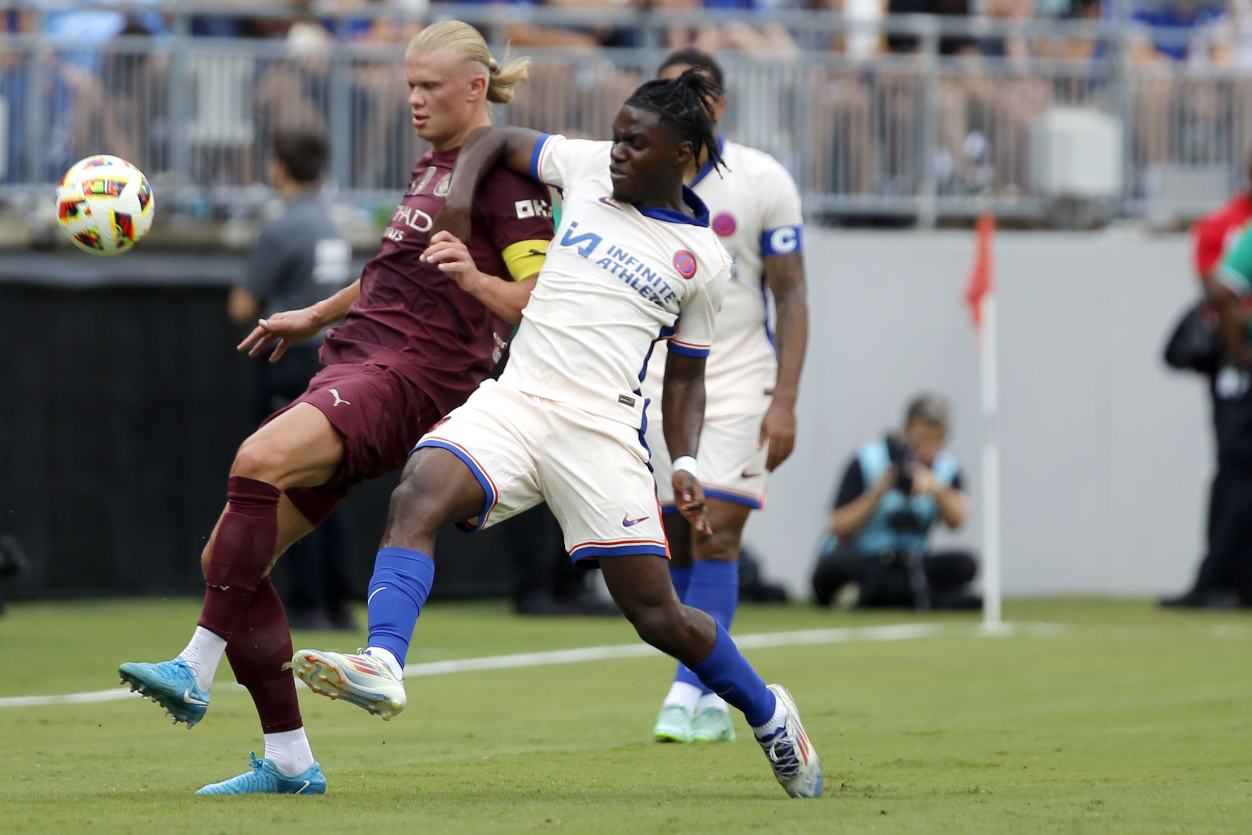 Manchester City's Erling Haaland battles for control of the ball with Chelsea's Romeo Lavia during the FC Series soccer match, Saturday, Aug. 3, 2024, in Columbus, Ohio. 