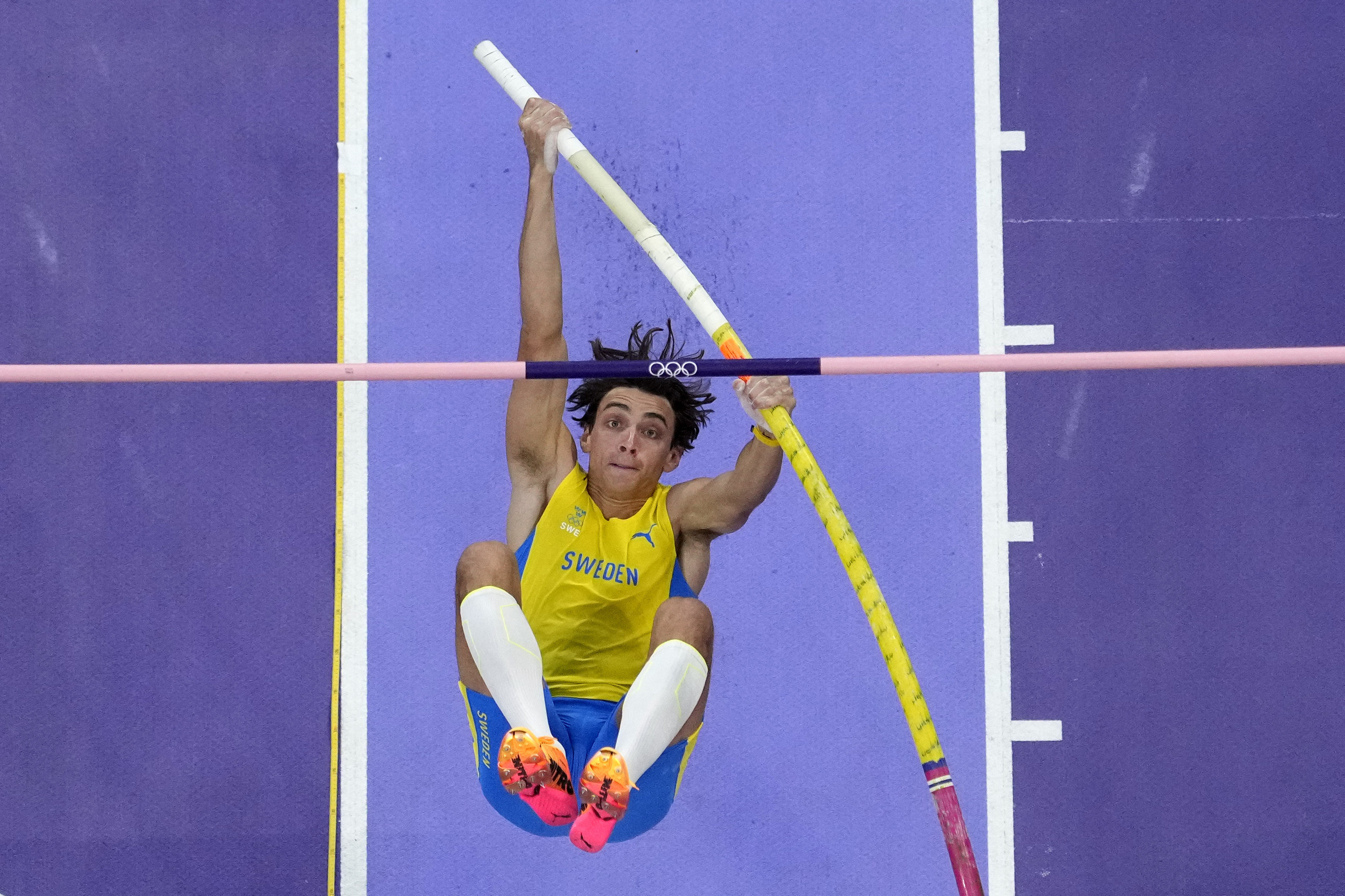 Armand Duplantis, of Sweden, competes in the men's pole vault final at the 2024 Summer Olympics, Monday, Aug. 5, 2024, in Saint-Denis, France. 