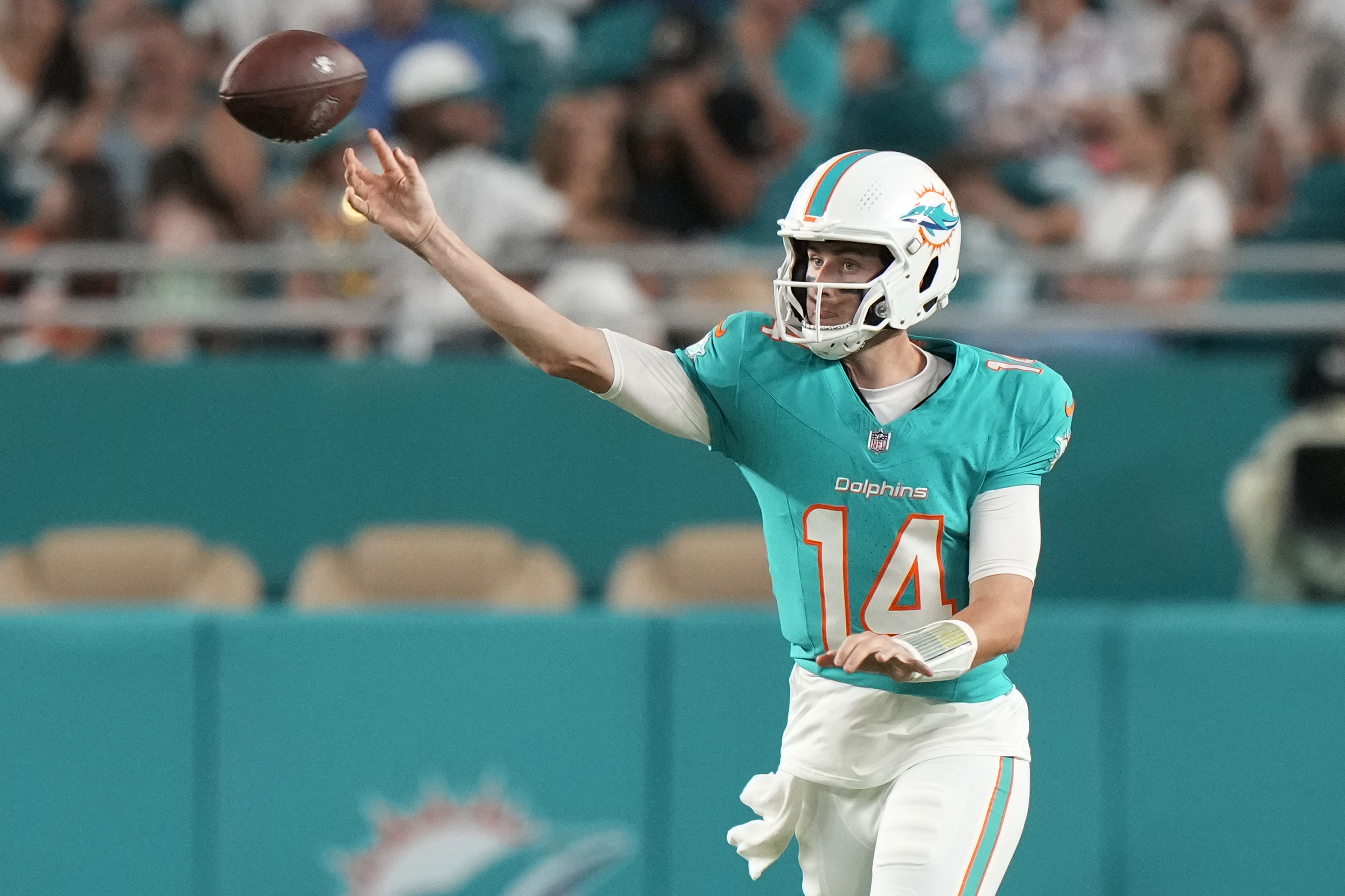 Miami Dolphins quarterback Mike White (14) throws during the second half of a preseason NFL football game against the Washington Commanders, Saturday, Aug. 17, 2024, in Miami Gardens, Fla. 
