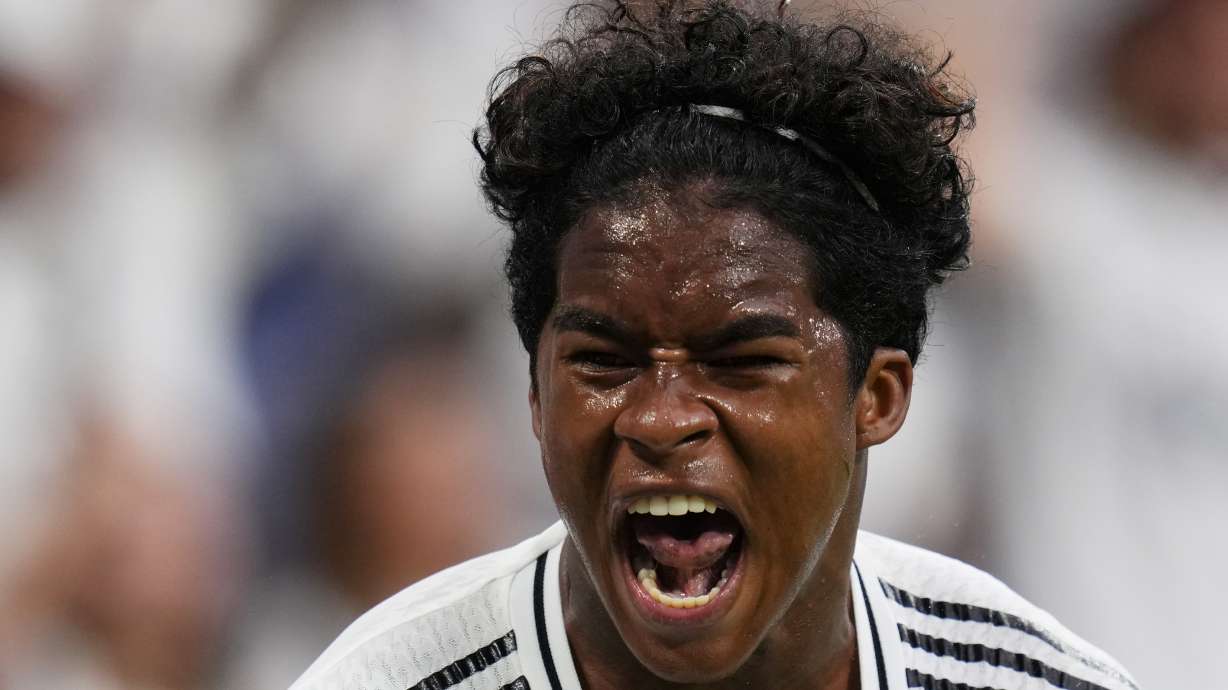 Real Madrid's Endrick celebrates after scoring his side's third goal during the Spanish La Liga soccer match between Real Madrid and Valladolid at the Santiago Bernabeu stadium in Madrid, Spain, Sunday, Aug. 25, 2024.