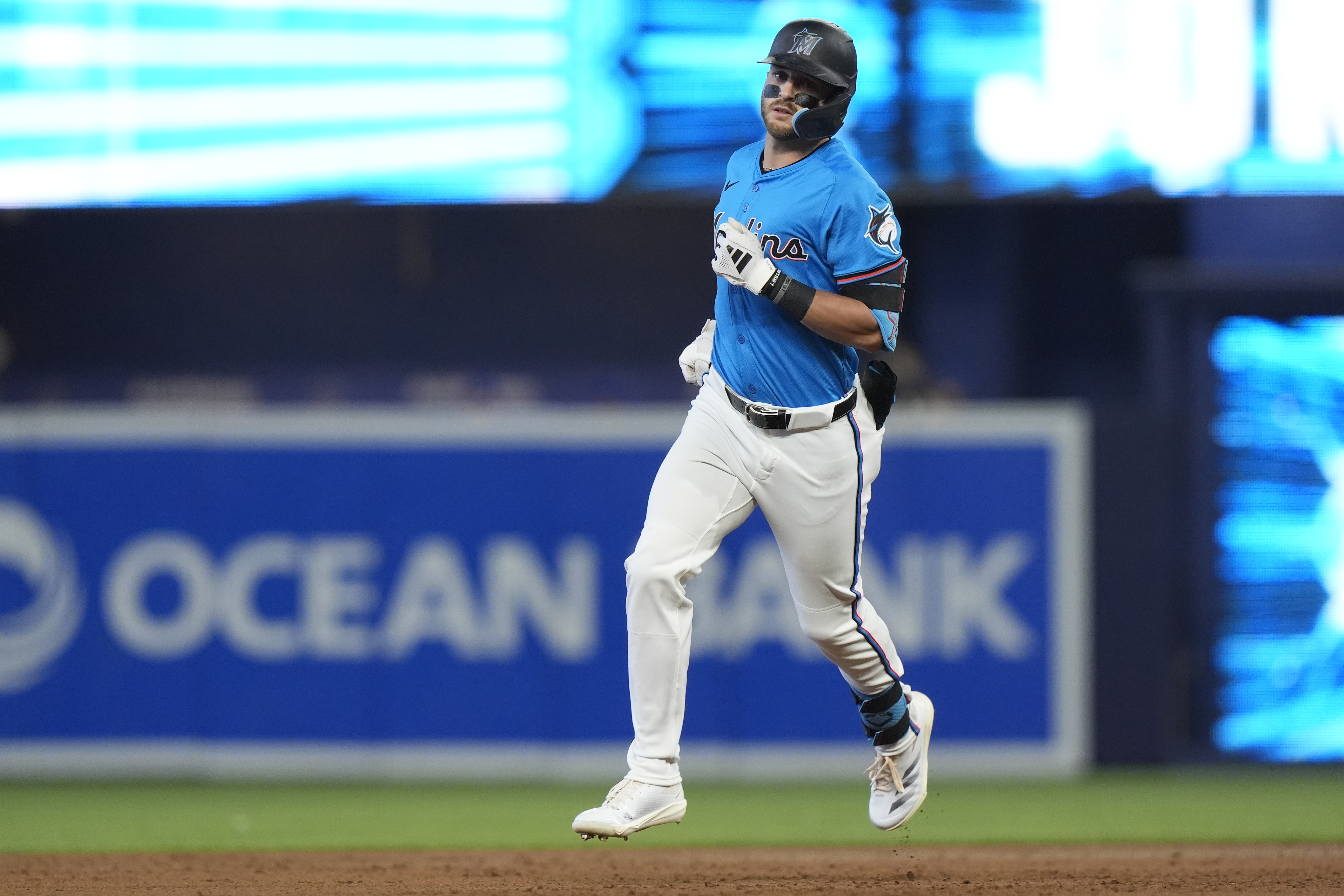 Miami Marlins' Connor Norby runs the bases after hitting a solo home run during the first inning of a baseball game against the Chicago Cubs, Sunday, Aug. 25, 2024, in Miami. 