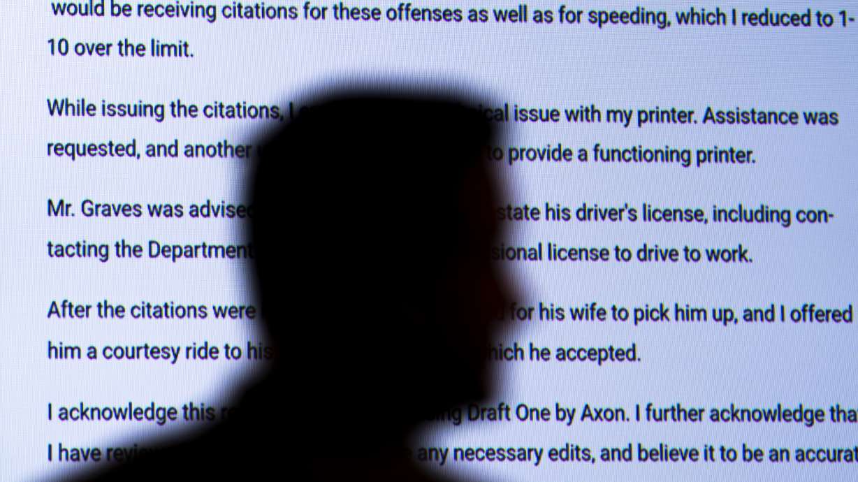 Captain Jason Bussert demonstrates an AI powered software that creates police reports from body cam audio, on May 31 in Oklahoma.