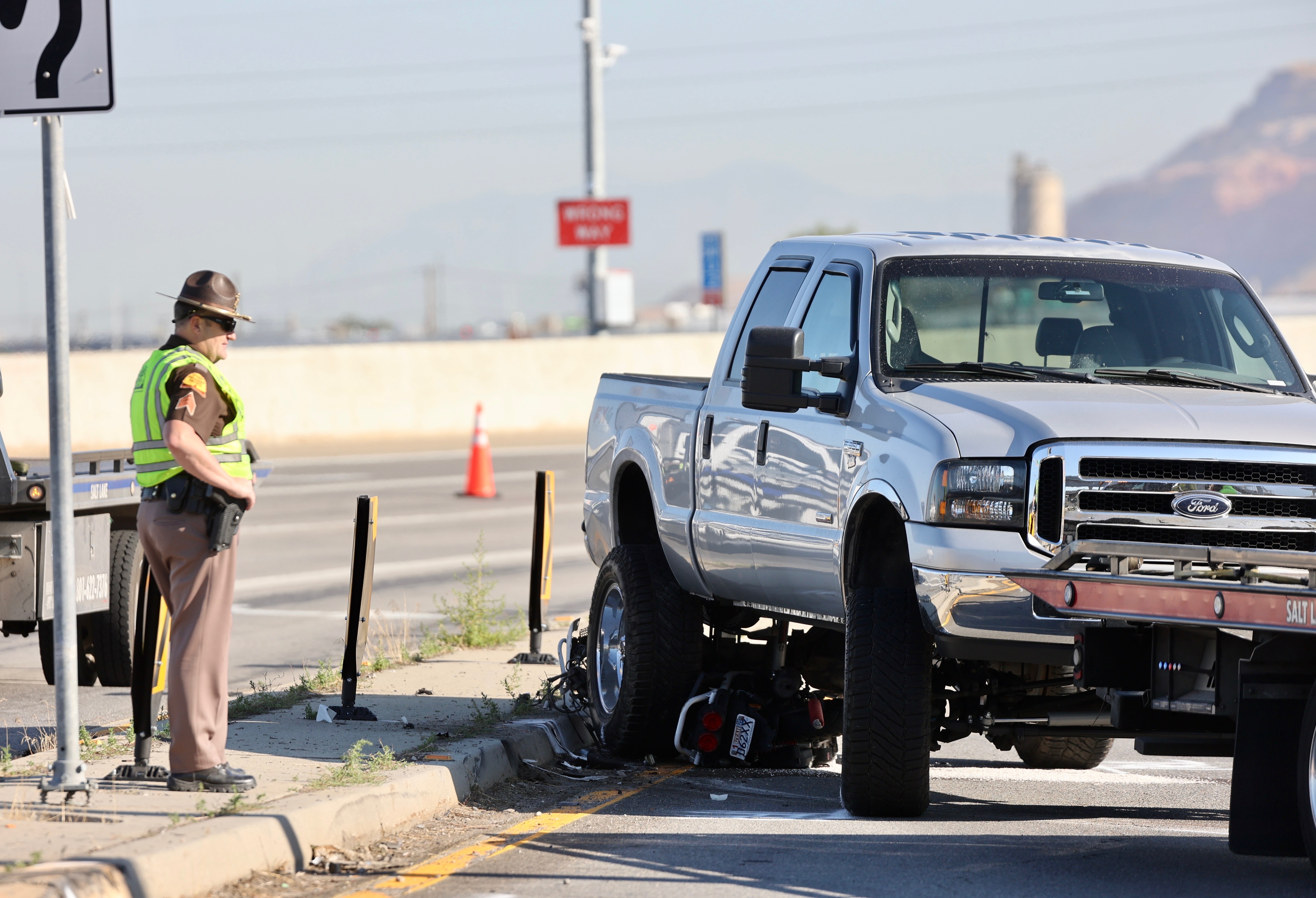 A motorcycle and truck struck collided in the middle of the intersection at 2100 South and 600 West in South Salt Lake on Monday.