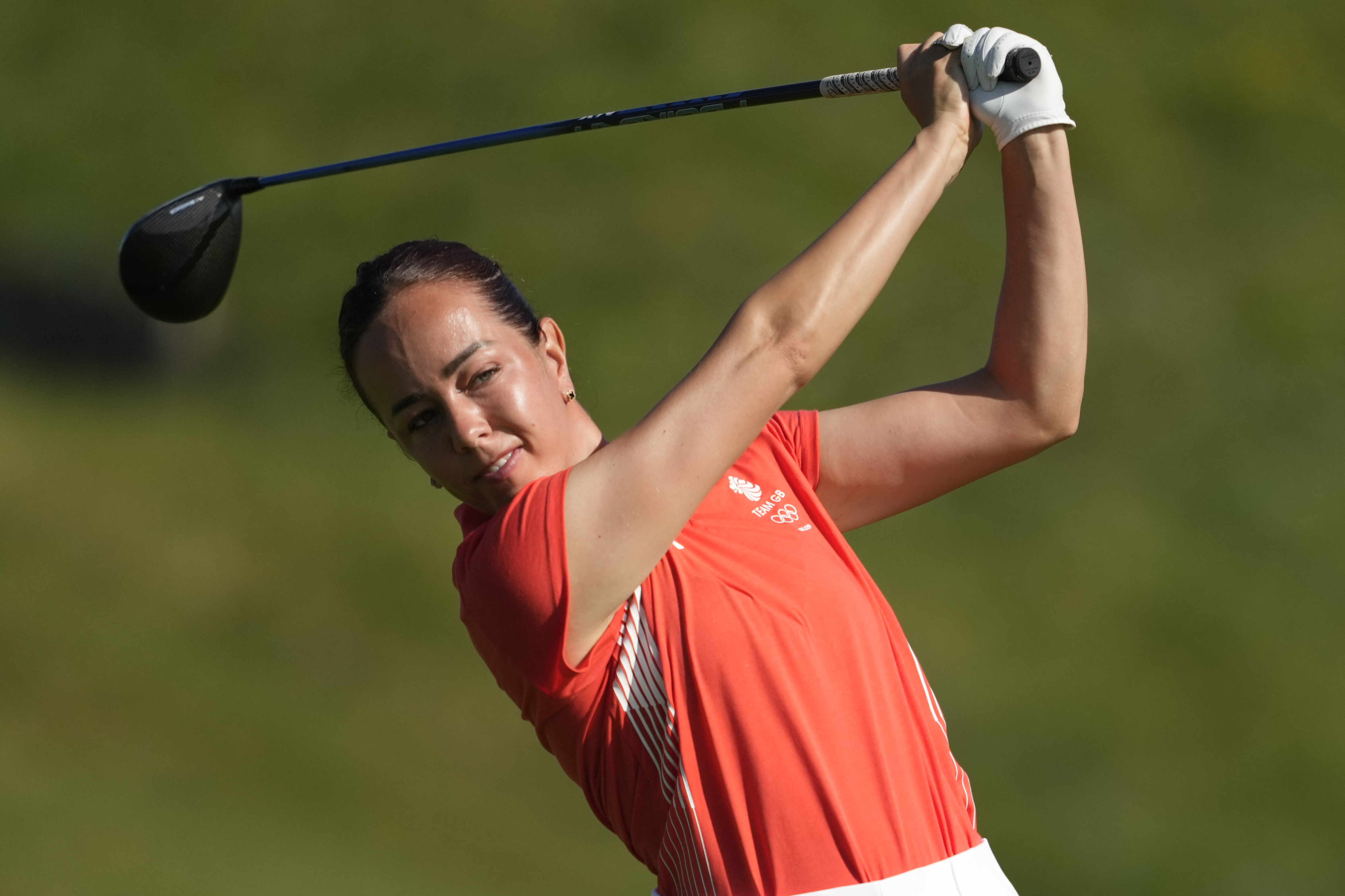 Georgia Hall, of Britain, hits her shot from the 3rd tee during the second round of the women's golf event at the 2024 Summer Olympics, Thursday, Aug. 8, 2024, at Le Golf National, in Saint-Quentin-en-Yvelines, France. 