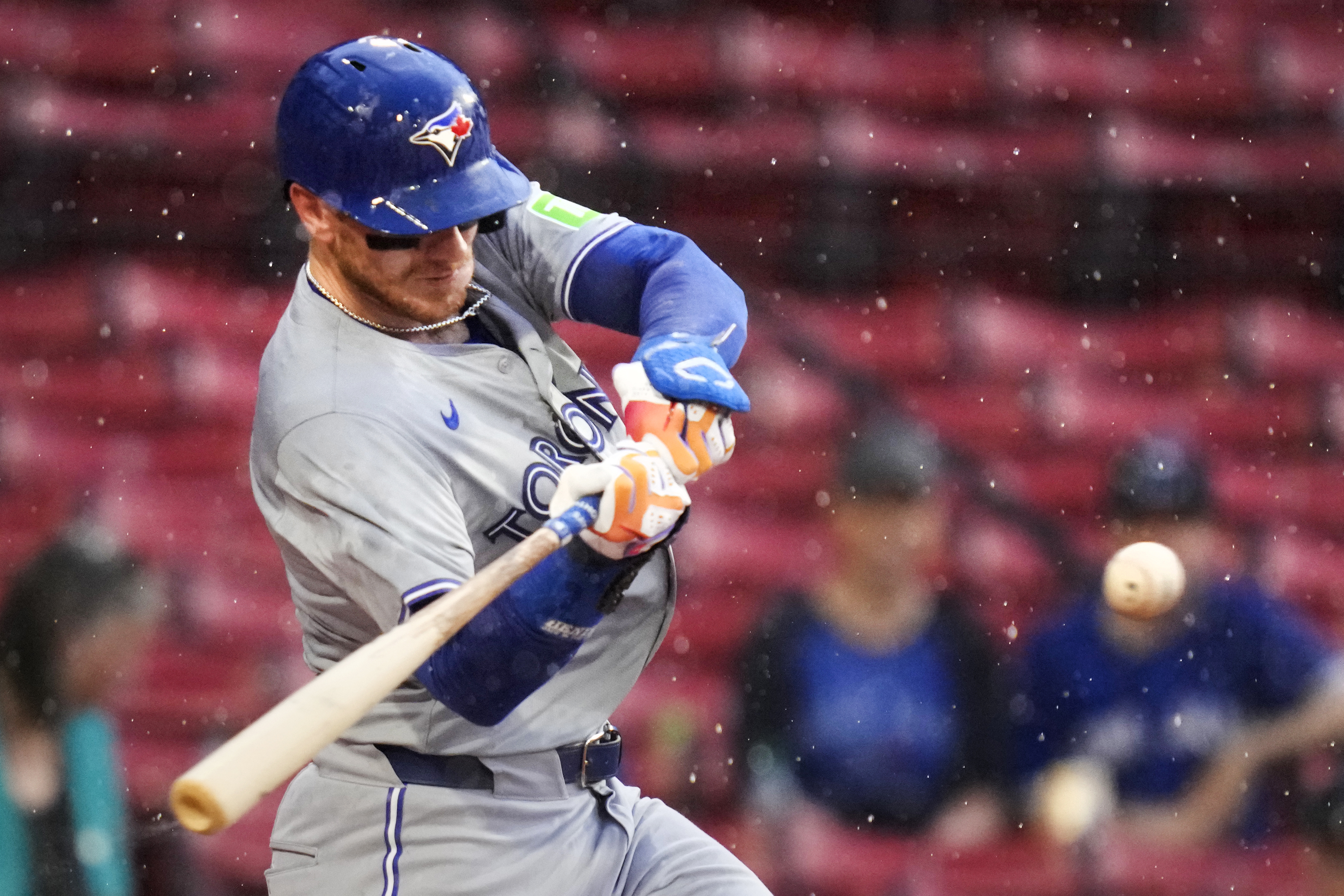 Toronto Blue Jays' Danny Jansen takes swings on a pitch shortly before the game was delayed during his at-bat due to heavy rain in the first inning of a baseball game at Fenway Park, Wednesday, June 26, 2024, in Boston. Jansen, who was traded by the Blue Jays to the Red Sox on July 27th, is scheduled to be in the line-up against his former team when the delayed game continues on Aug. 26, 2026. Jansen would become the first major league player to appear in the same game for both teams. 