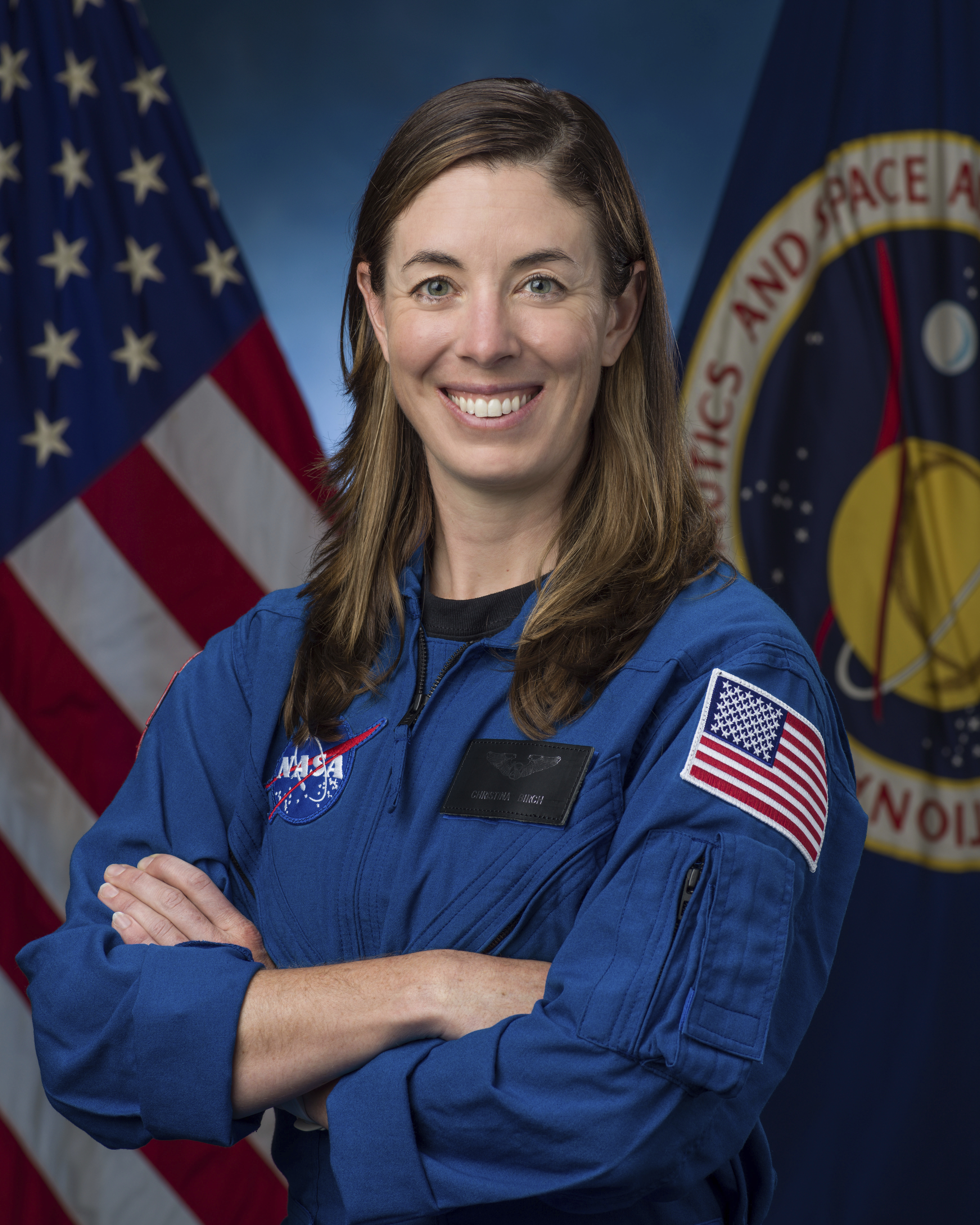This photo provided by NASA shows astronaut candidate Christina Birch, ASCAN Class of 2021, as she poses for an official NASA photo in Houston, Texas, Dec. 3, 2021.