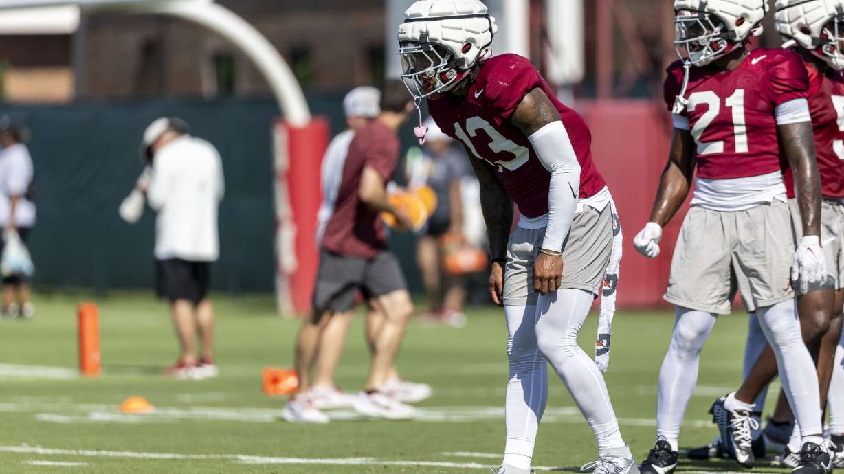 Alabama defensive back Malachi Moore (13) works through drills during an NCAA college football practice, Saturday, Aug. 3, 2024, at the Thomas-Drew Practice Fields in Tuscaloosa, Ala.