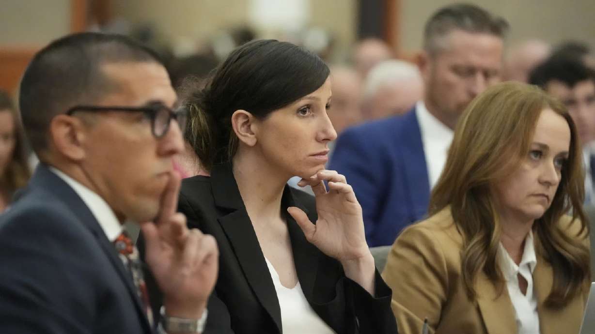 Kouri Richins, a Kamas mother who wrote a children's book about coping with grief after her husband's death and was later accused of fatally poisoning him, looks on during a hearing on Aug. 26.