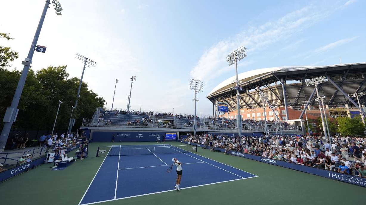 Sebastian Baez, of Argentina, serves to Luciano Darderi, of Italy, during a first round match of the U.S. Open tennis championships, Monday, Aug. 26, 2024, in New York.