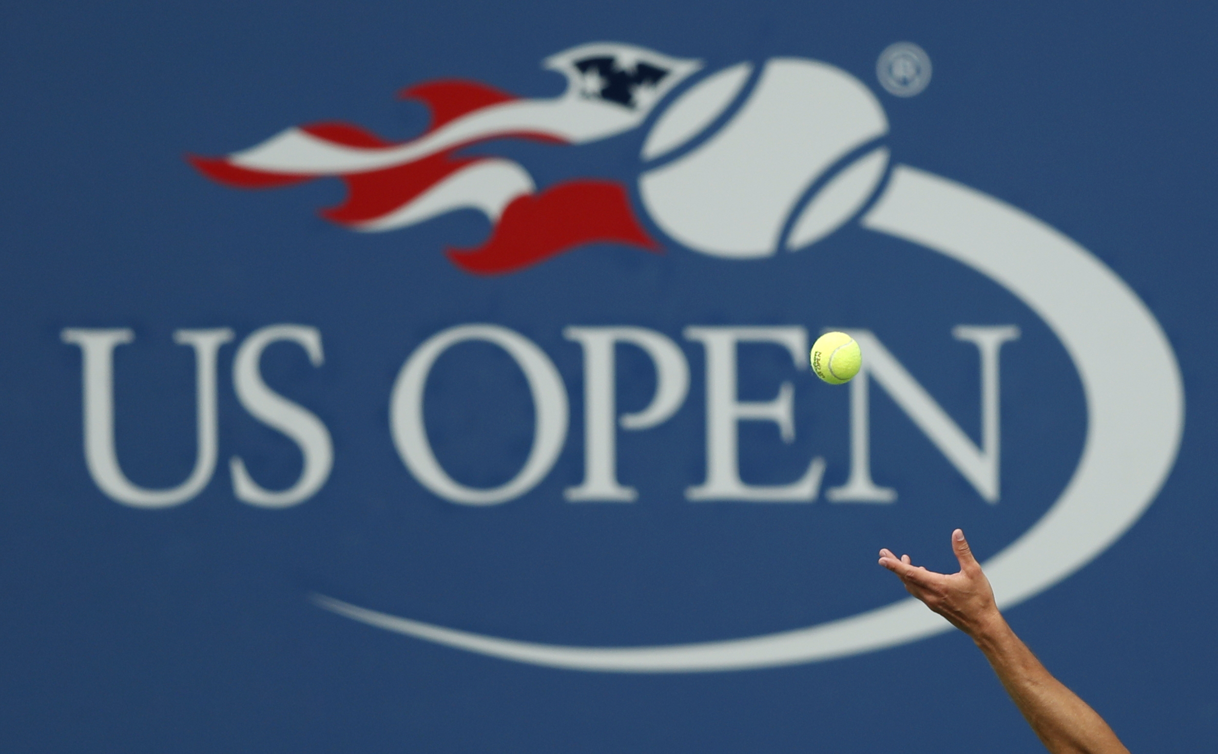 FILE - Philipp Kohlschreiber, of Germany, serves to John Millman, of Australia, during the third round of the U.S. Open tennis tournament in New York, Sept. 2, 2017. The 2024 U.S. Open begins Monday, Aug. 26.