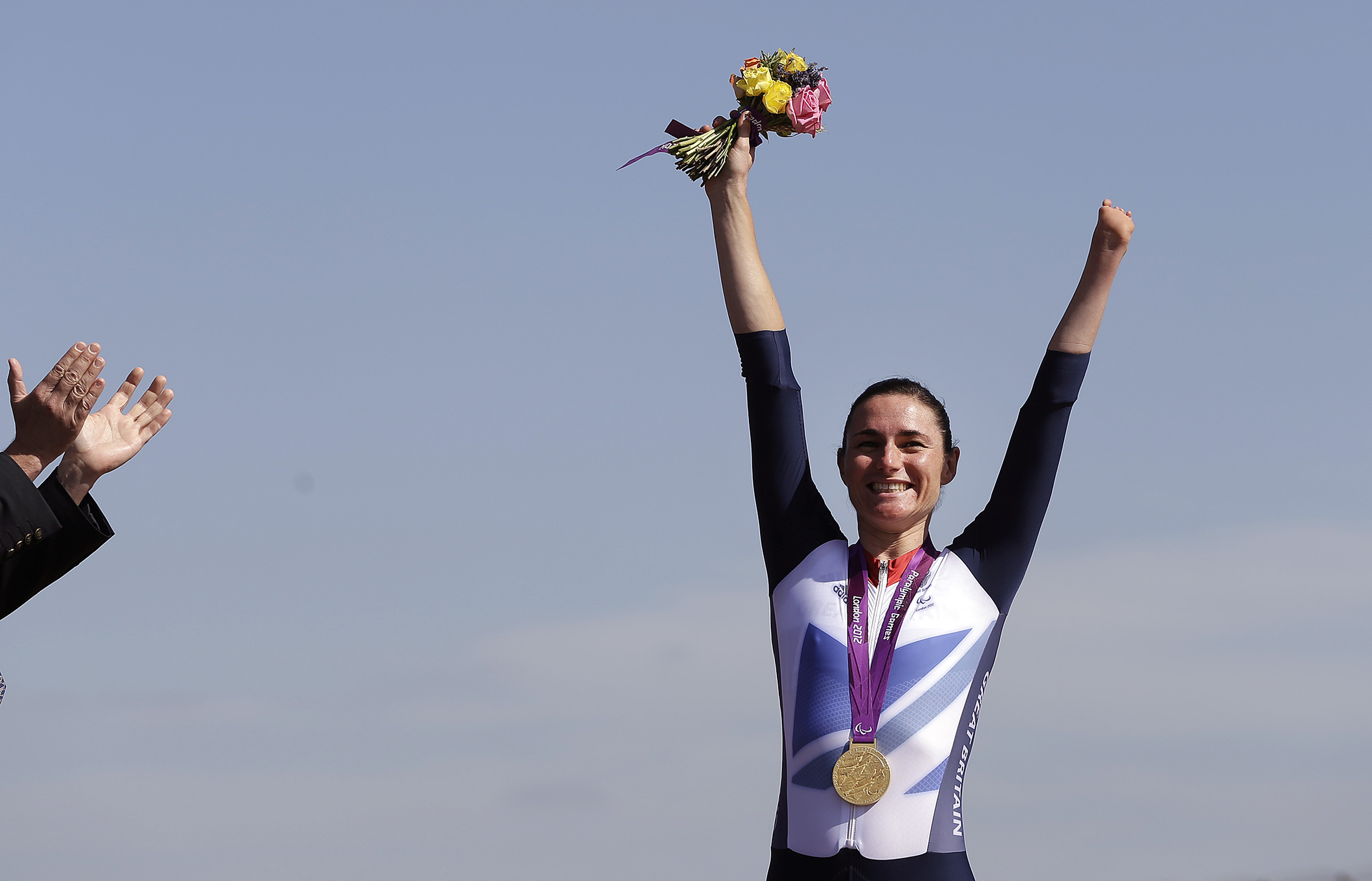 FILE - Sarah Storey of Britain celebrates with her gold medal during the medal ceremony for the women's road cycling individual time trial C1 category the at the 2012 Paralympics games, Wednesday, Sept. 5, 2012, at Brands Hatch motor racing circuit near London.