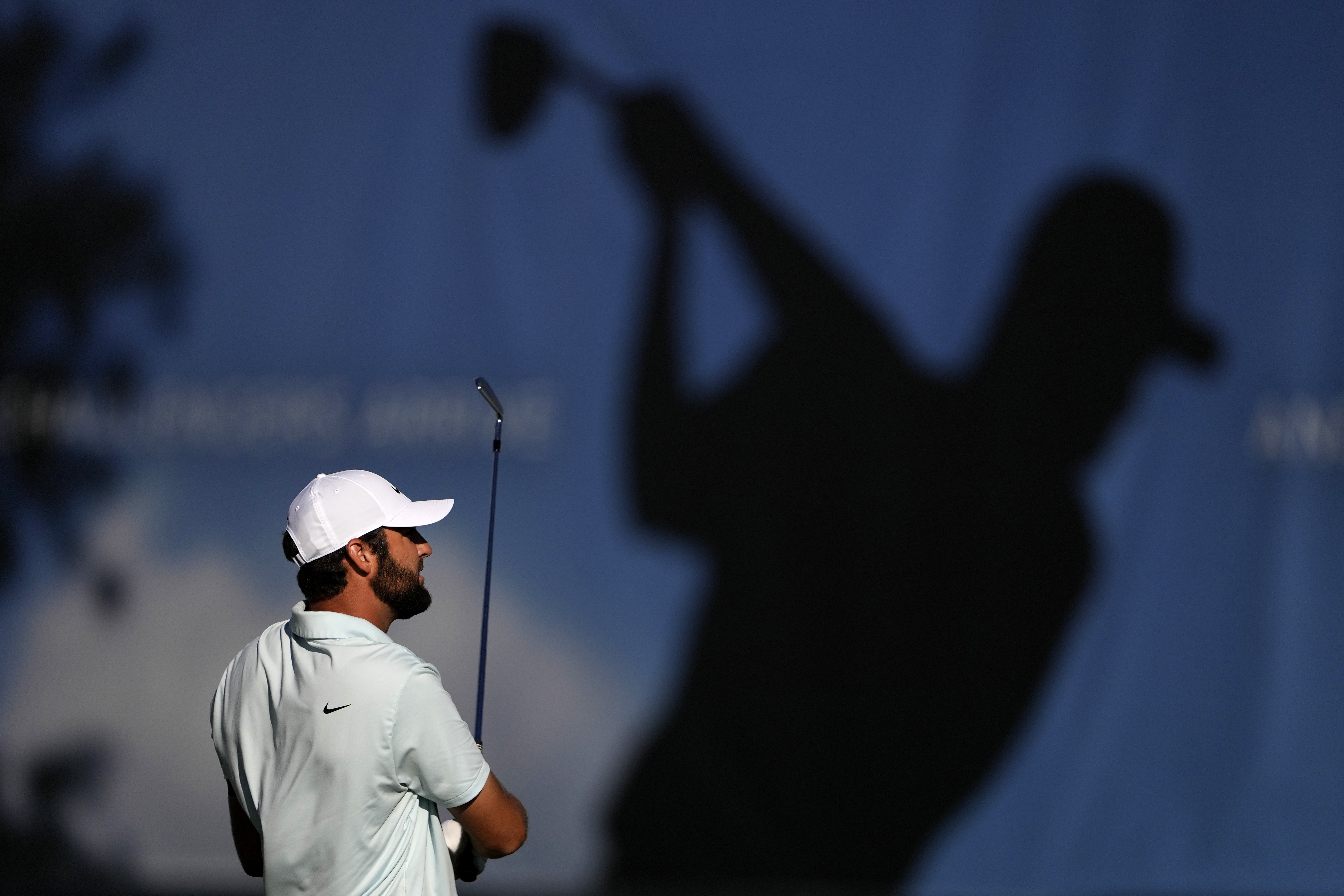 Scottie Scheffler hits on the driving range prior to the third round of the BMW Championship golf event at Castle Pines Golf Club, Saturday, Aug. 24, 2024, in Castle Rock, Colo. 