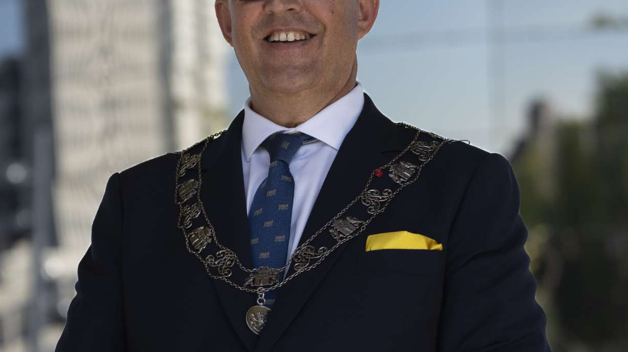 Rotterdam mayor Ahmed Aboutaleb waits on the podium prior to the first stage of the Tour de France Women cycling race with start in Rotterdam and finish in The Hague, Netherlands, Monday, Aug. 12, 2024.