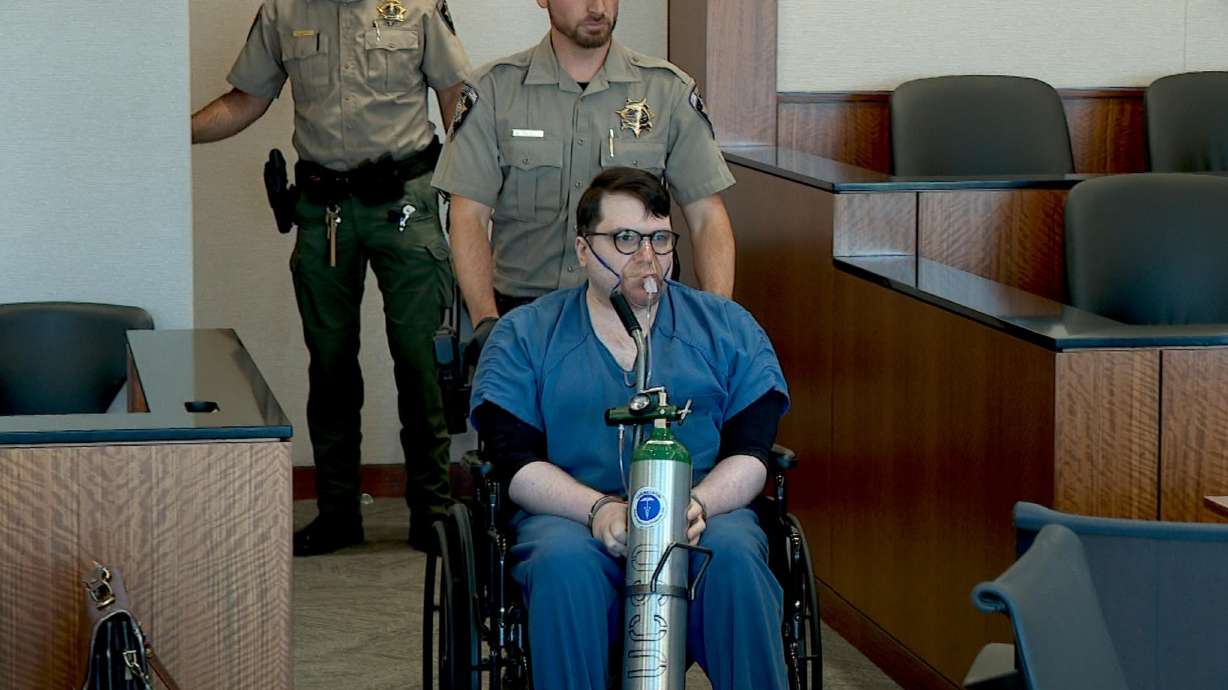 Nicholas Rossi is brought into his preliminary hearing in 4th District Court on Aug. 27. On Friday, a jury trial was set in his 3rd District Court case.