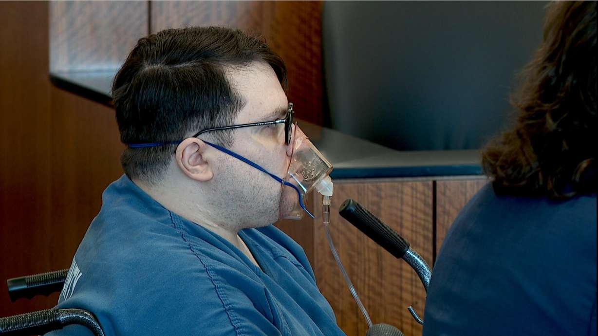 Nicholas Rossi sits as attorneys discuss his 4th District Court case on Aug. 27, 2024. His Salt Lake County trial is set to begin next week, while his Utah County trial is next month.