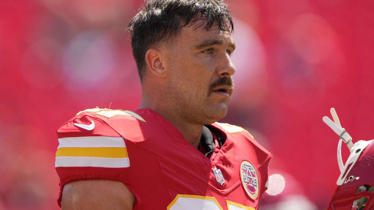 Kansas City Chiefs tight end Travis Kelce (87) warms up before an NFL preseason football game against the Detroit Lions Saturday, Aug. 17, 2024, in Kansas City, Mo.