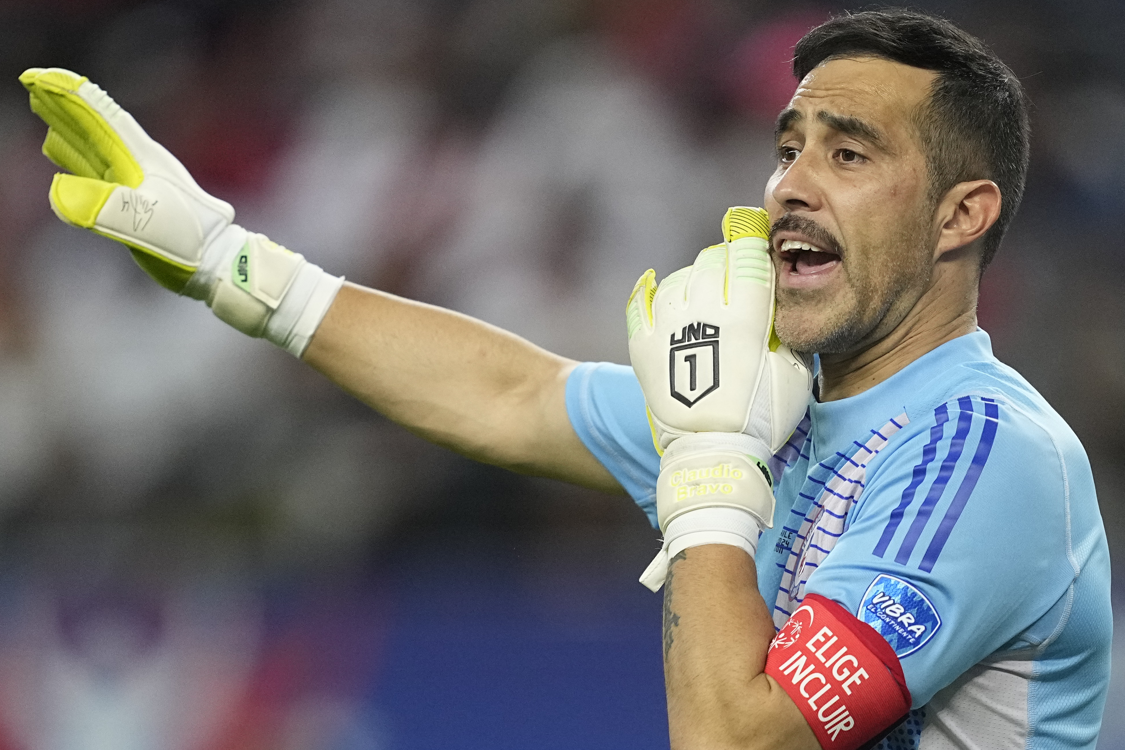 FILE - Chile's goalkeeper Claudio Bravo yells during a Copa America Group A soccer match against Peru in Arlington, Texas, June 21, 2024. 