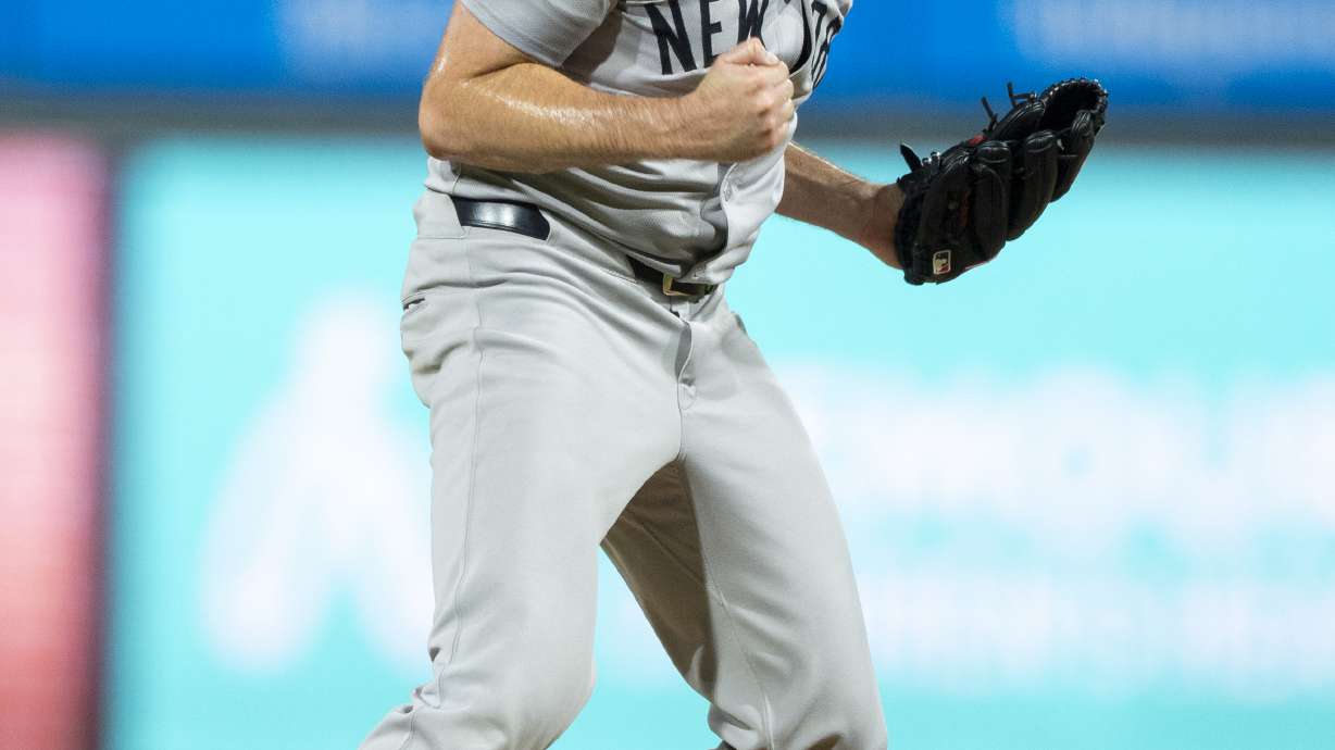 New York Yankees relief pitcher Michael Tonkin reacts to the final out of the 12th inning of a baseball game against the Philadelphia Phillies, Tuesday, July 30, 2024, in Philadelphia.