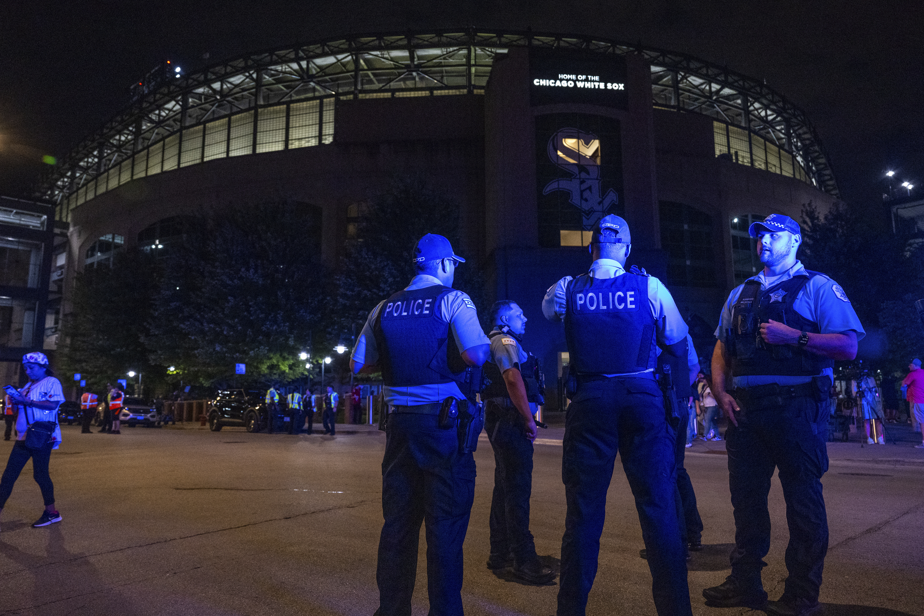 FILE - Chicago police officers respond to a shooting during a White Sox's game at Guaranteed Rate Field, Aug. 25, 2023, in Chicago. 