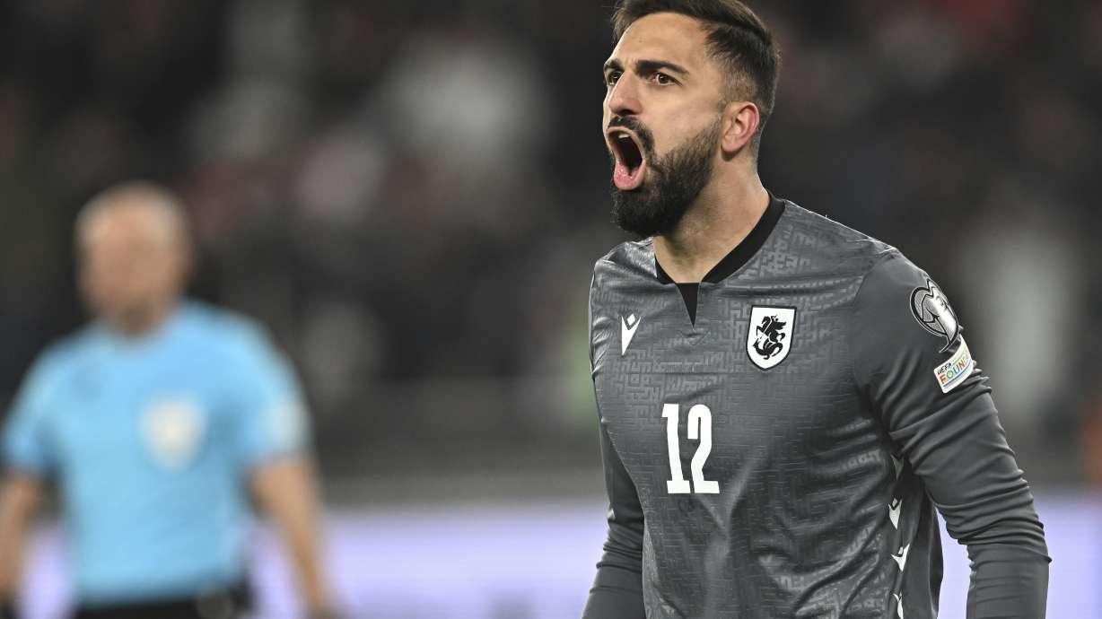 FILE - Georgia goalkeeper Giorgi Mamardashvili reacts after his save during a penalty shootout at the end of the Euro 2024 qualifying play-off soccer match between Georgia and Greece at the Boris Paichadze National Stadium in Tbilisi, Georgia, March 26, 2024.