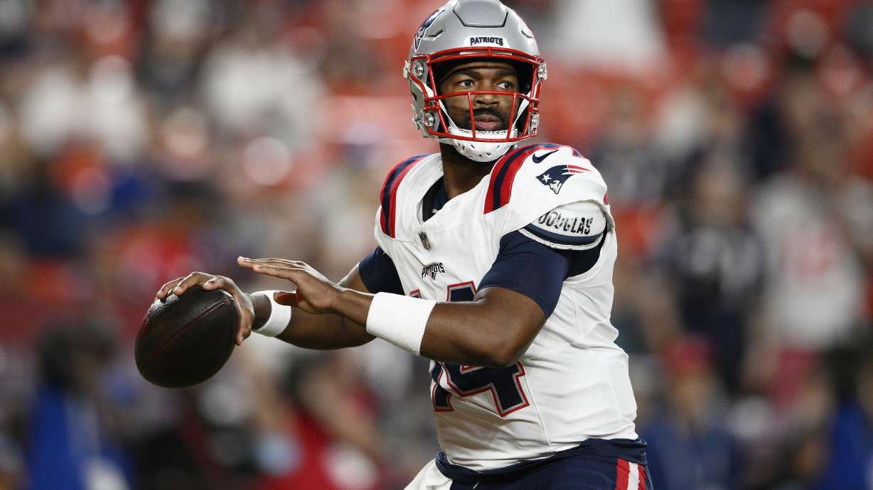 New England Patriots quarterback Jacoby Brissett passes against the Washington Commanders during the first half of a preseason NFL football game, Sunday, Aug. 25, 2024, in Landover, Md.
