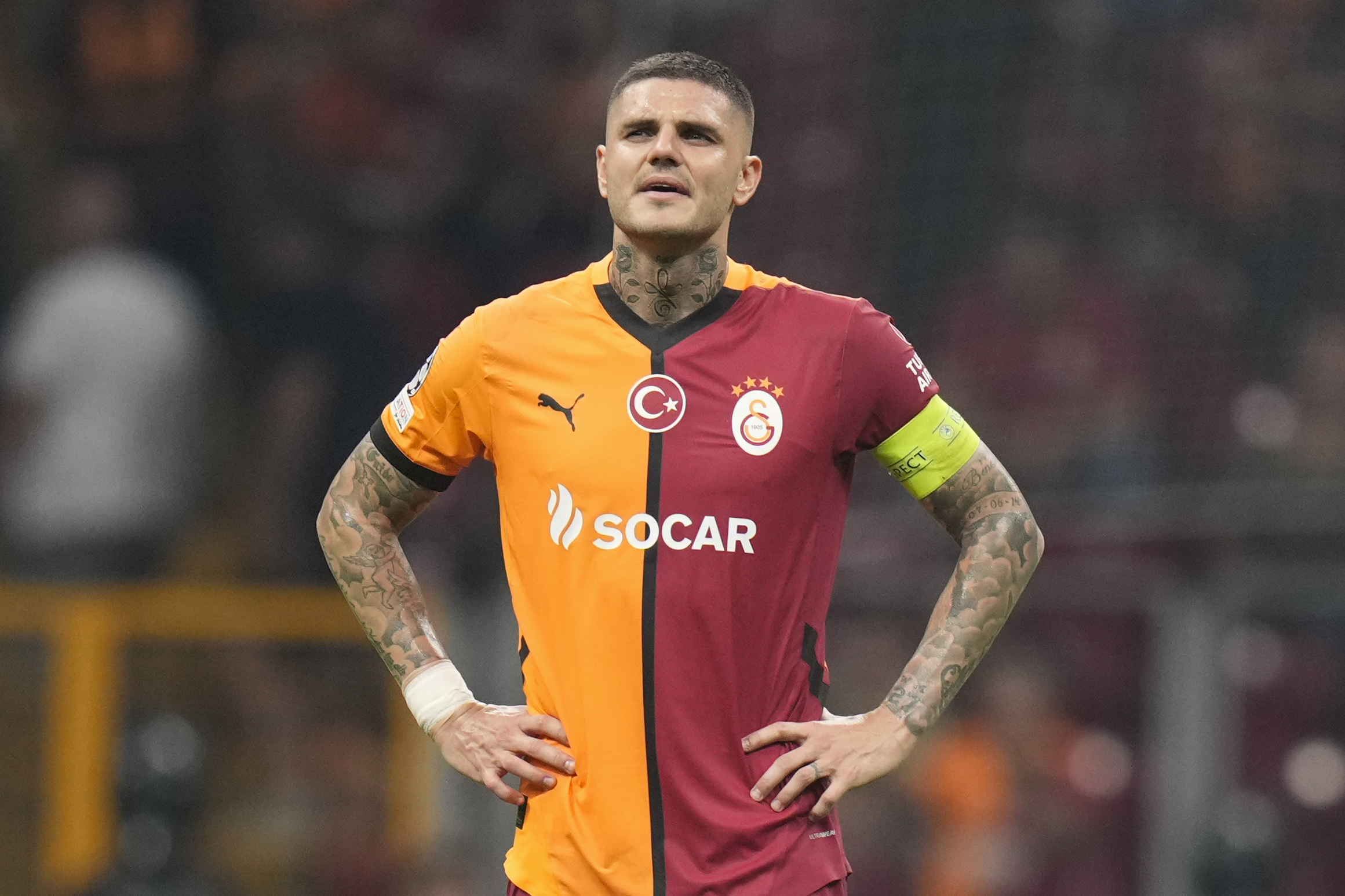 Galatasaray's Mauro Icardi, walks off the pitch after his team lose the Champions League play-off second leg soccer match between Galatasaray and Young Boys in Istanbul, Turkey, Tuesday, Aug. 27, 2024.