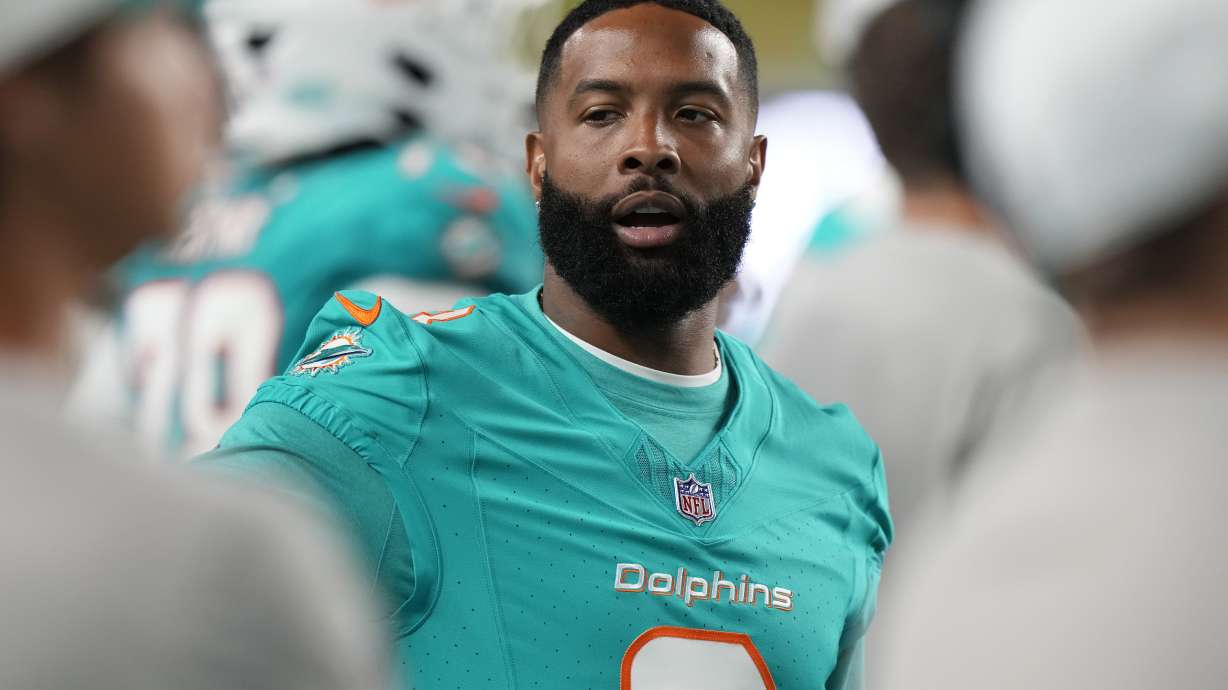 Miami Dolphins wide receiver Odell Beckham Jr. walks the sideline during the second half of a pre season NFL football game against the Atlanta Falcons, Friday, Aug. 9, 2024, in Miami Gardens, Fla.
