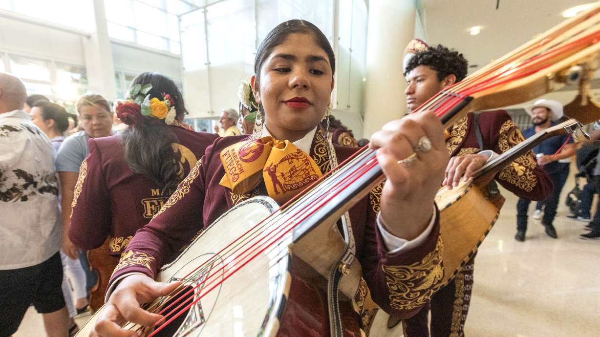 Brianne Juarez, 13, with Mariachi Fuego practices before performing at the Mariachi Festival in Salt Lake City on July 19. A new Census Bureau tool provides readily accessible data detailing the explosive expansion of the nation's Latino community.
