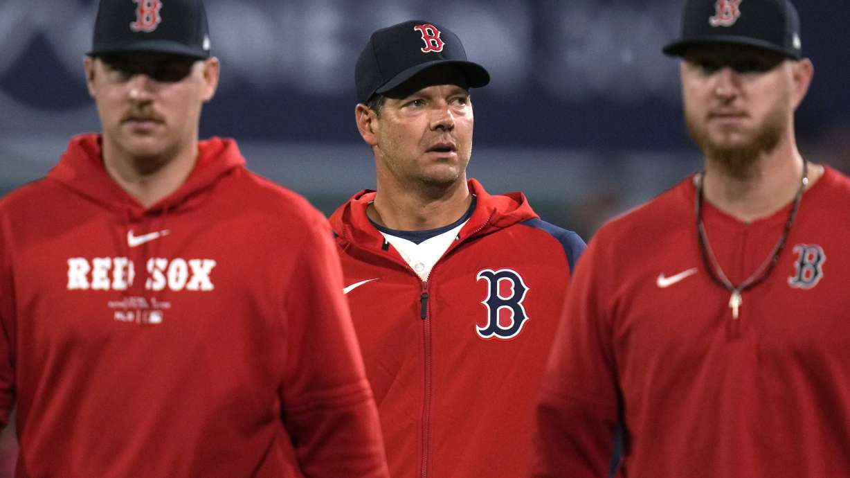 Boston Red Sox pitcher Rich Hill, center, walks from the bullpen after a baseball game against the Toronto Blue Jays at Fenway Park, Tuesday, Aug. 27, 2024, in Boston.