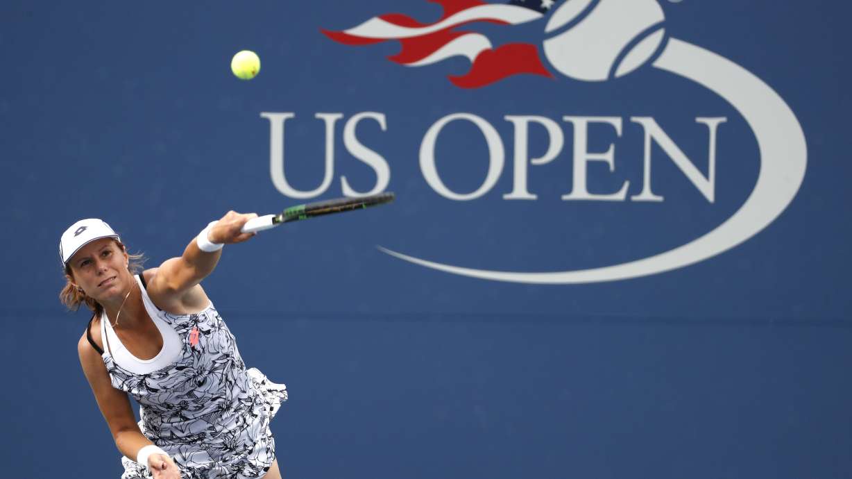 FILE - Varvara Lepchenko, of the United States, serves to Ana Konjuh, of Croatia, during the third round of the U.S. Open tennis tournament, Sept. 3, 2016, in New York.