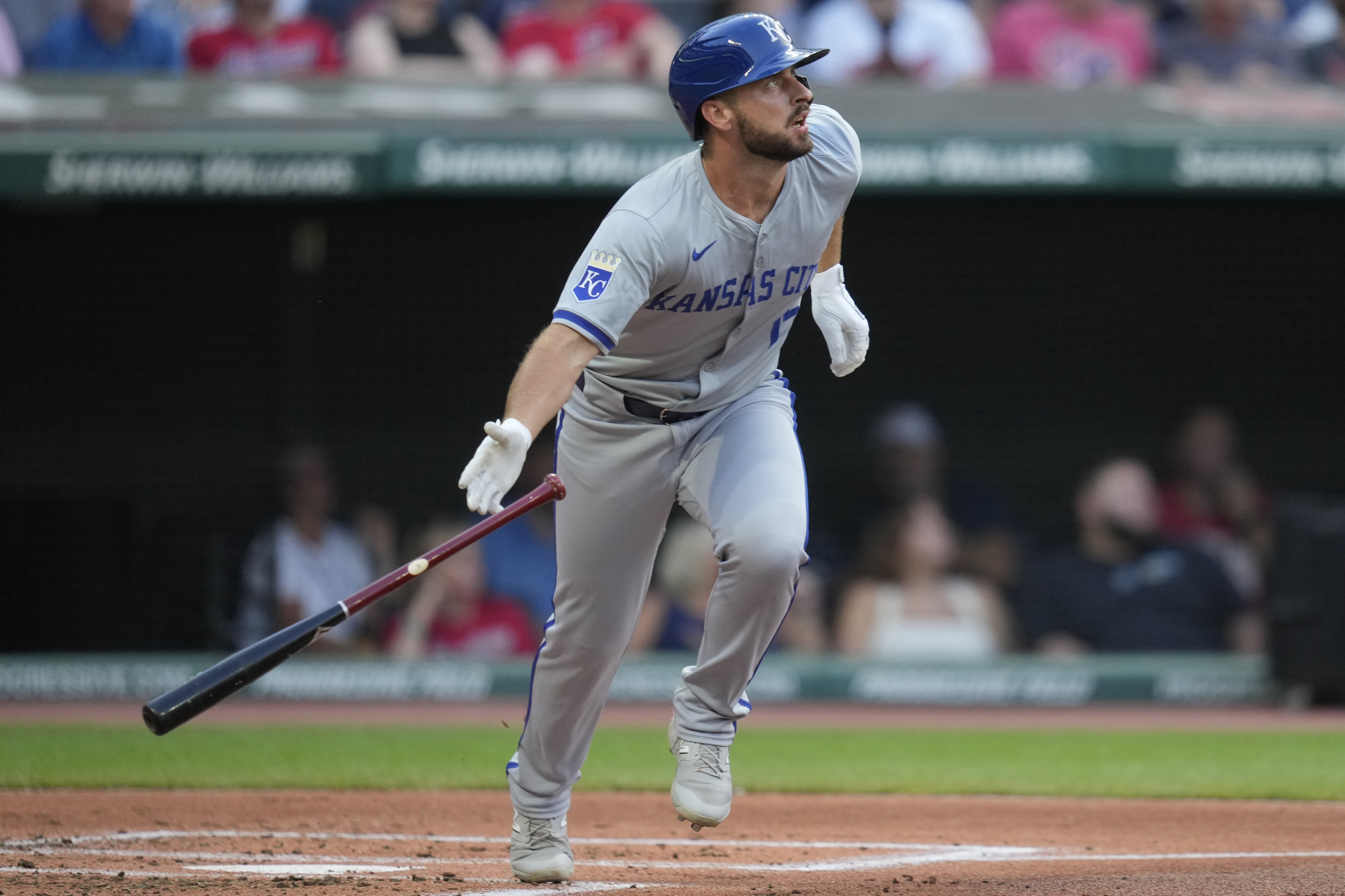 Kansas City Royals' Paul DeJong watches his home run in the second inning of a baseball game against the Cleveland Guardians, Tuesday, Aug. 27, 2024, in Cleveland. 