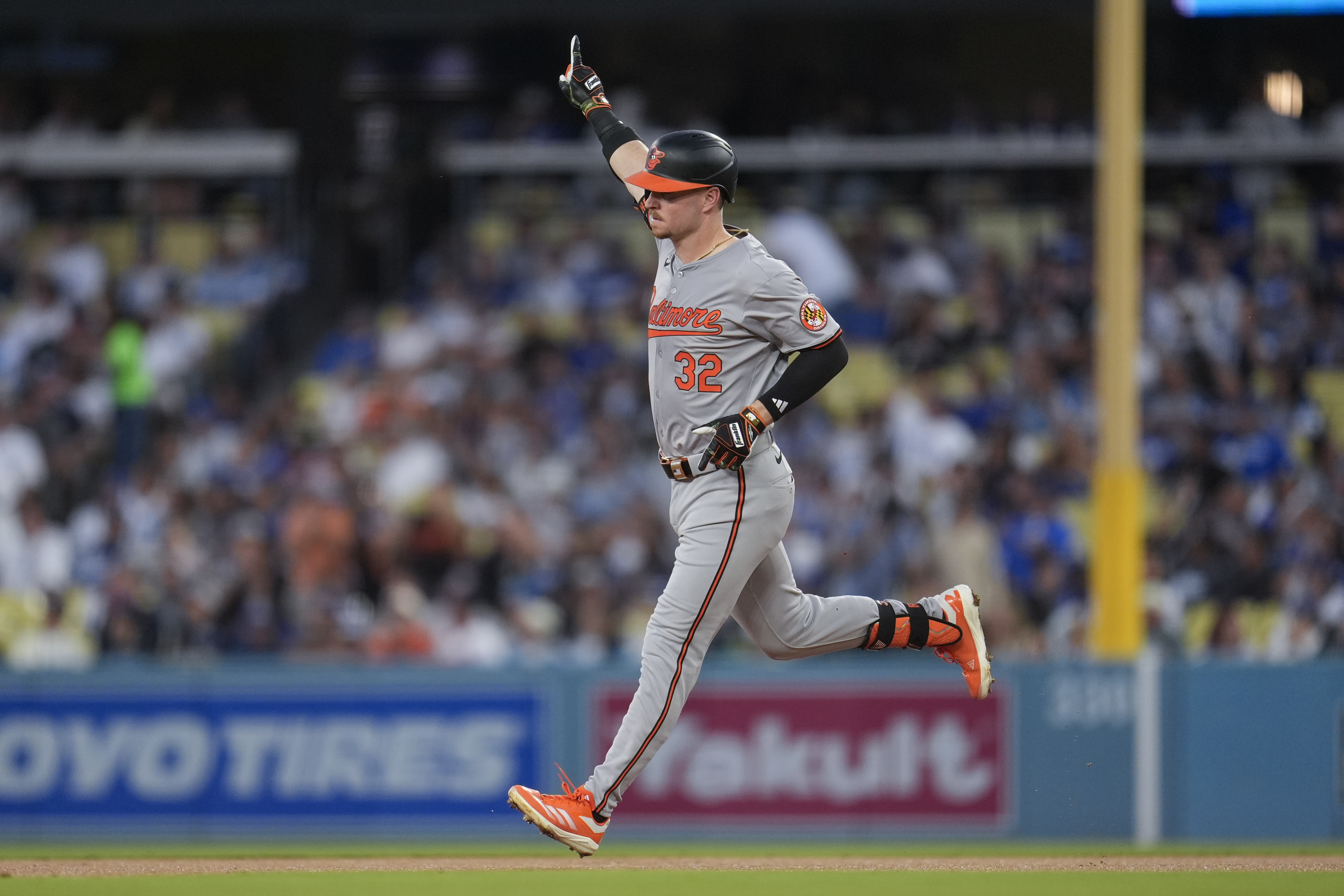 Baltimore Orioles' Ryan O'Hearn celebrates as he rounds the bases after a solo home run during the second inning of a baseball game against the Los Angeles Dodgers, Tuesday, Aug. 27, 2024, in Los Angeles.