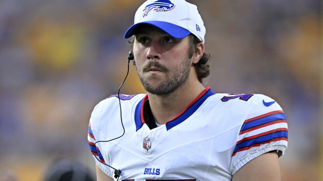 Buffalo Bills quarterback Josh Allen stands on the sidelines during the first half of an NFL exhibition football game against the Pittsburgh Steelers, Saturday, Aug. 17, 2024, in Pittsburgh.