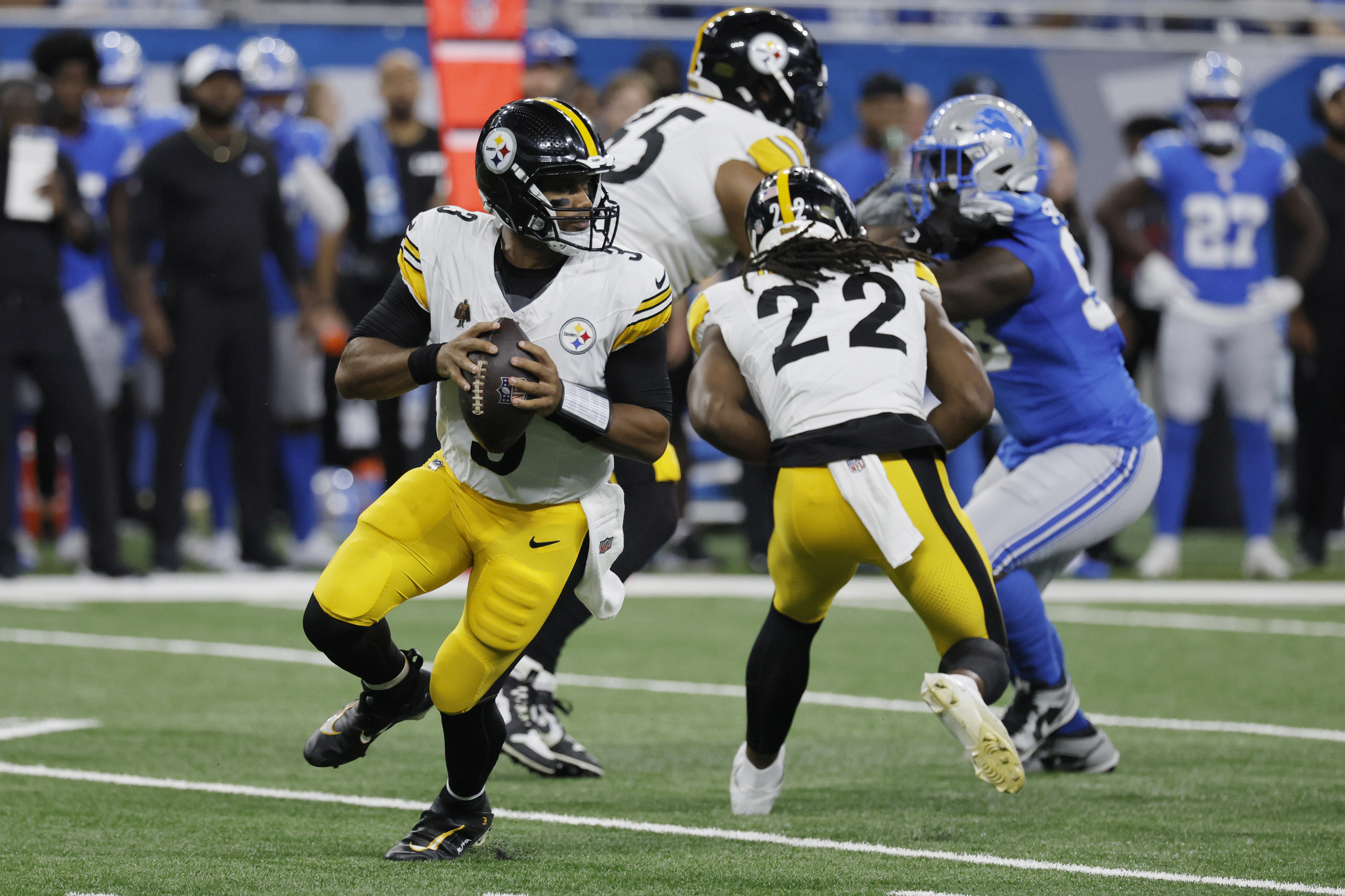 Pittsburgh Steelers quarterback Russell Wilson looks downfield during the first half of an NFL preseason football game against the Detroit Lions, Saturday, Aug. 24, 2024, in Detroit.