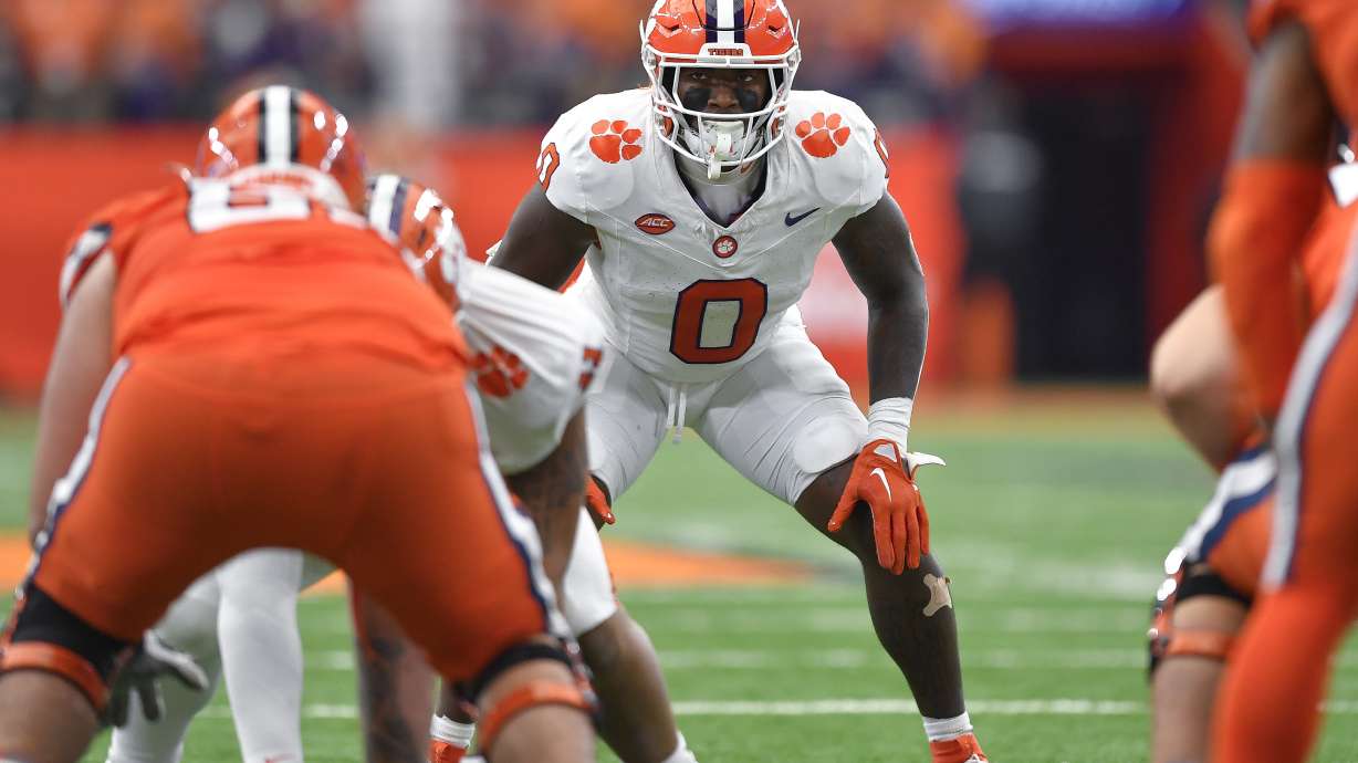 FILE - Clemson linebacker Barrett Carter (0) lines up during the first half of an NCAA college football game against Syracuse in Syracuse, N.Y., Saturday, Sept. 30, 2023.