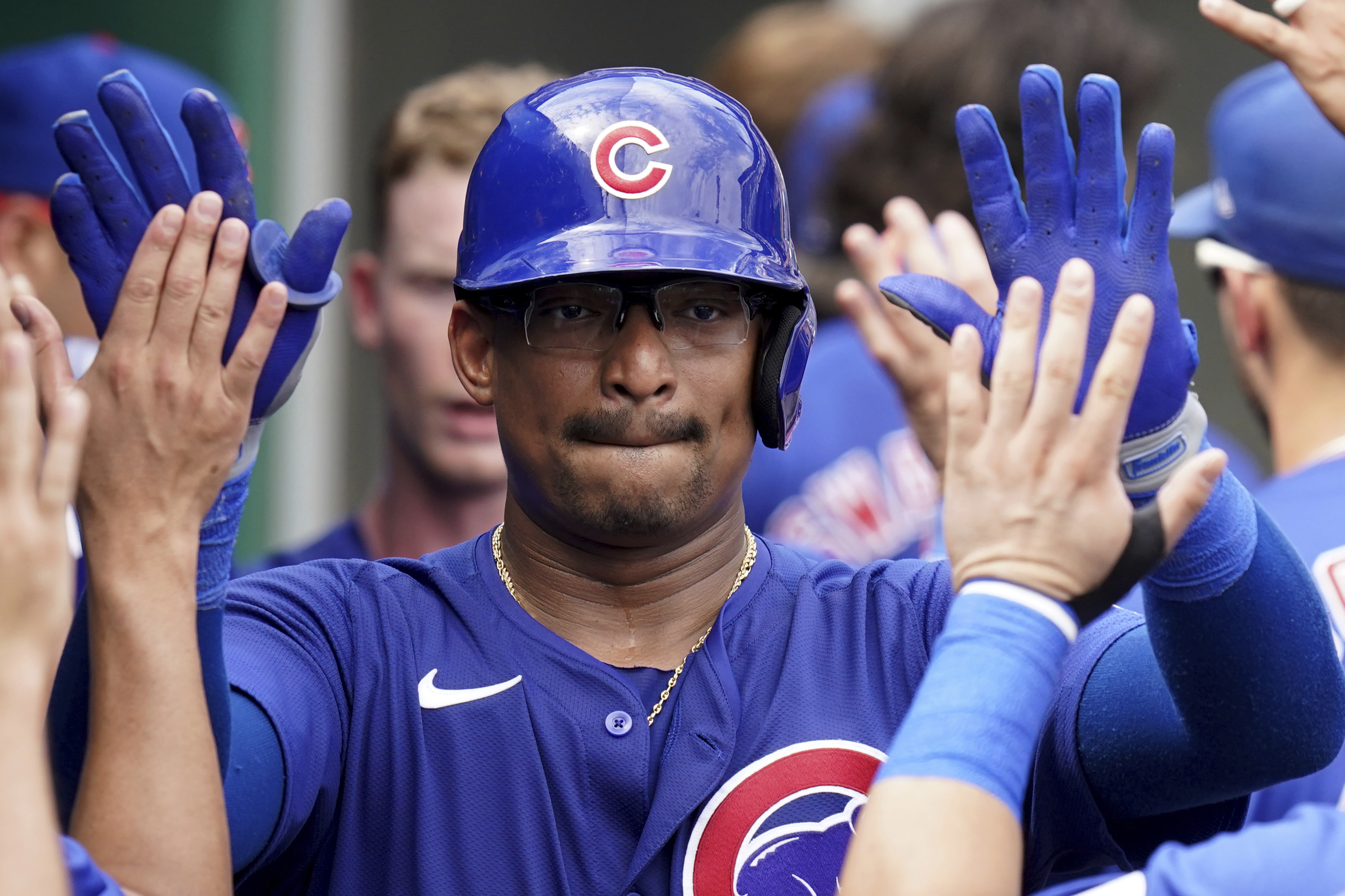 Chicago Cubs' Christian Bethancourt celebrates in the dugout after hitting a two-run home run during the seventh inning of a baseball game against the Pittsburgh Pirates Wednesday, Aug. 28, 2024, in Pittsburgh. 