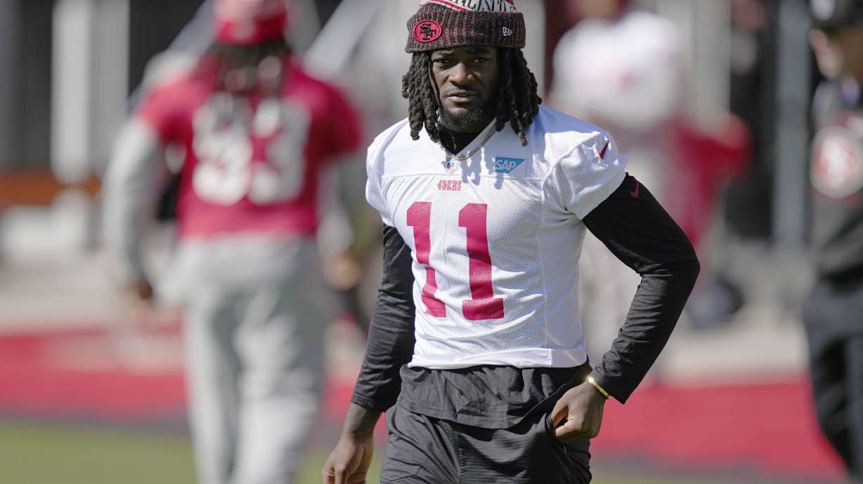 FILE - San Francisco 49ers wide receiver Brandon Aiyuk (11) warms up during a practice ahead of the Super Bowl 58 NFL football game Saturday, Feb. 10, 2024, in Las Vegas.