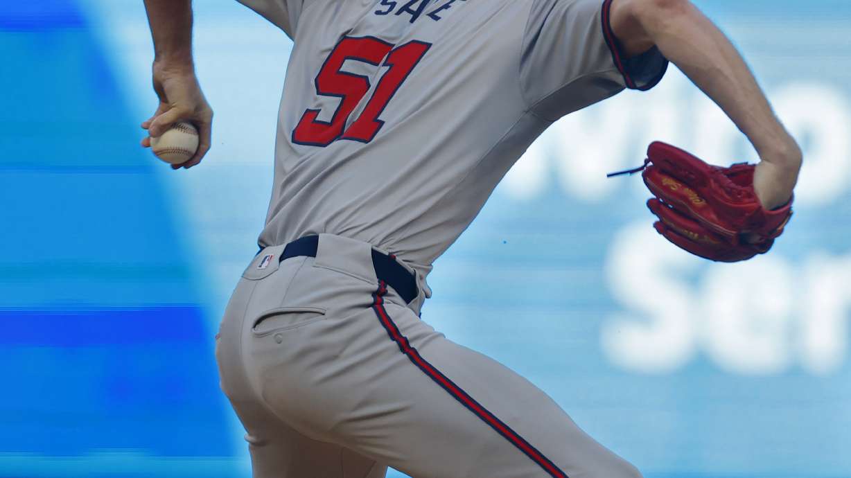 Atlanta Braves starting pitcher Chris Sale throws to the Minnesota Twins in the first inning of a baseball game Wednesday, Aug. 28, 2024, in Minneapolis.