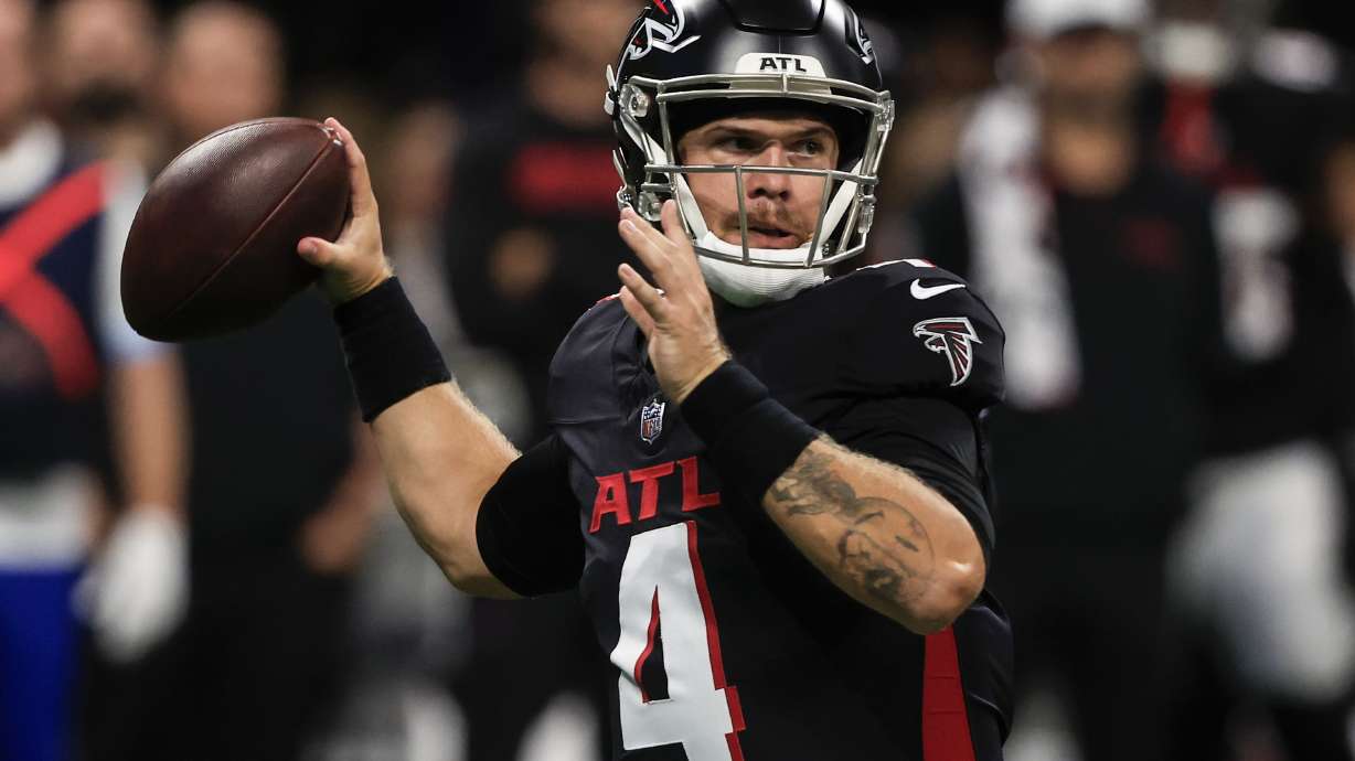 Atlanta Falcons quarterback Taylor Heinicke (4) works in the pocket against the Jacksonville Jaguars in the first half of an NFL preseason footballl game, Friday, Aug. 23, 2024, in Atlanta.