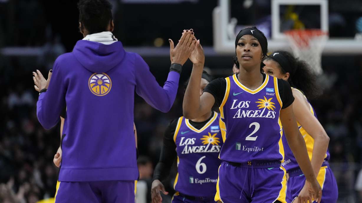 Los Angeles Sparks forward Rickea Jackson (2) celebrates during a timeout in the second half of a WNBA basketball game against the New York Liberty in Los Angeles, Wednesday, Aug. 28, 2024.