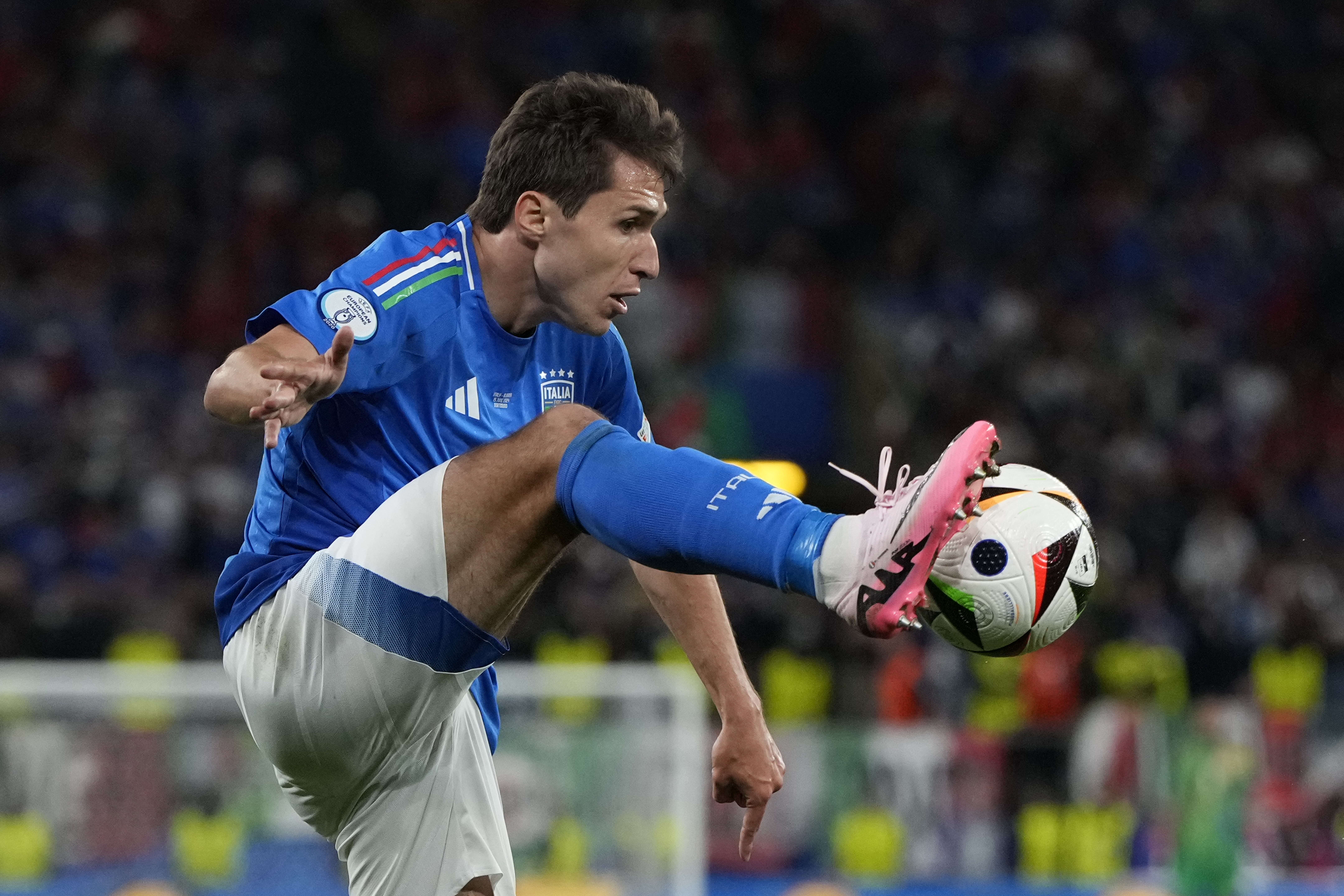 FILE - Italy's Federico Chiesa controls the ball during a Group B match between Italy and Albania at the Euro 2024 soccer tournament in Dortmund, Germany, June 15, 2024. 