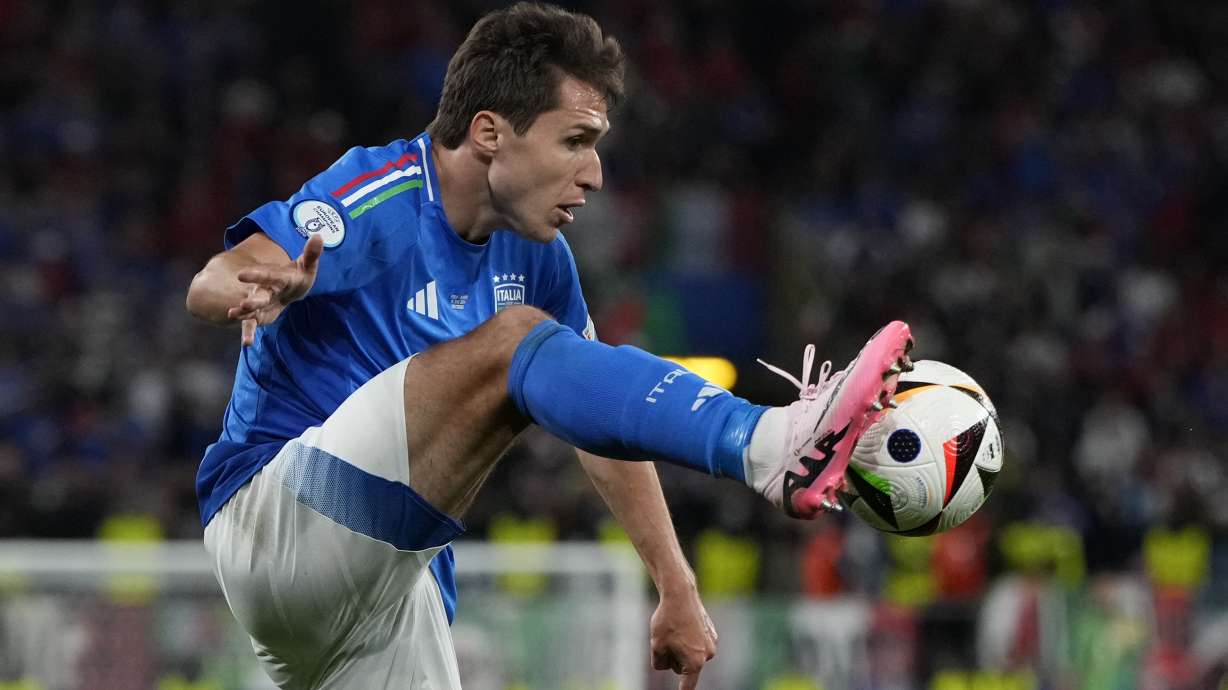 FILE - Italy's Federico Chiesa controls the ball during a Group B match between Italy and Albania at the Euro 2024 soccer tournament in Dortmund, Germany, June 15, 2024.