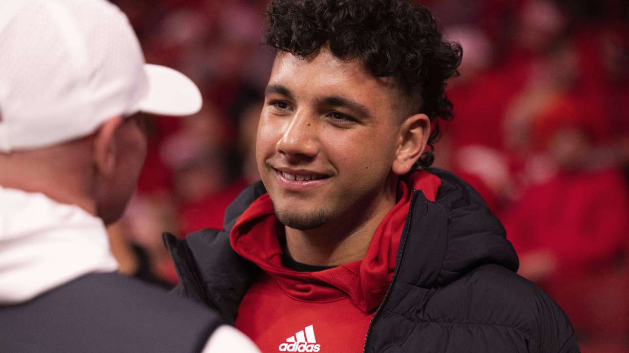 FILE - Dylan Raiola chats with supporters courtside before an NCAA college basketball game between Nebraska and Indiana, Wednesday, Jan. 3, 2024, in Lincoln, Neb.