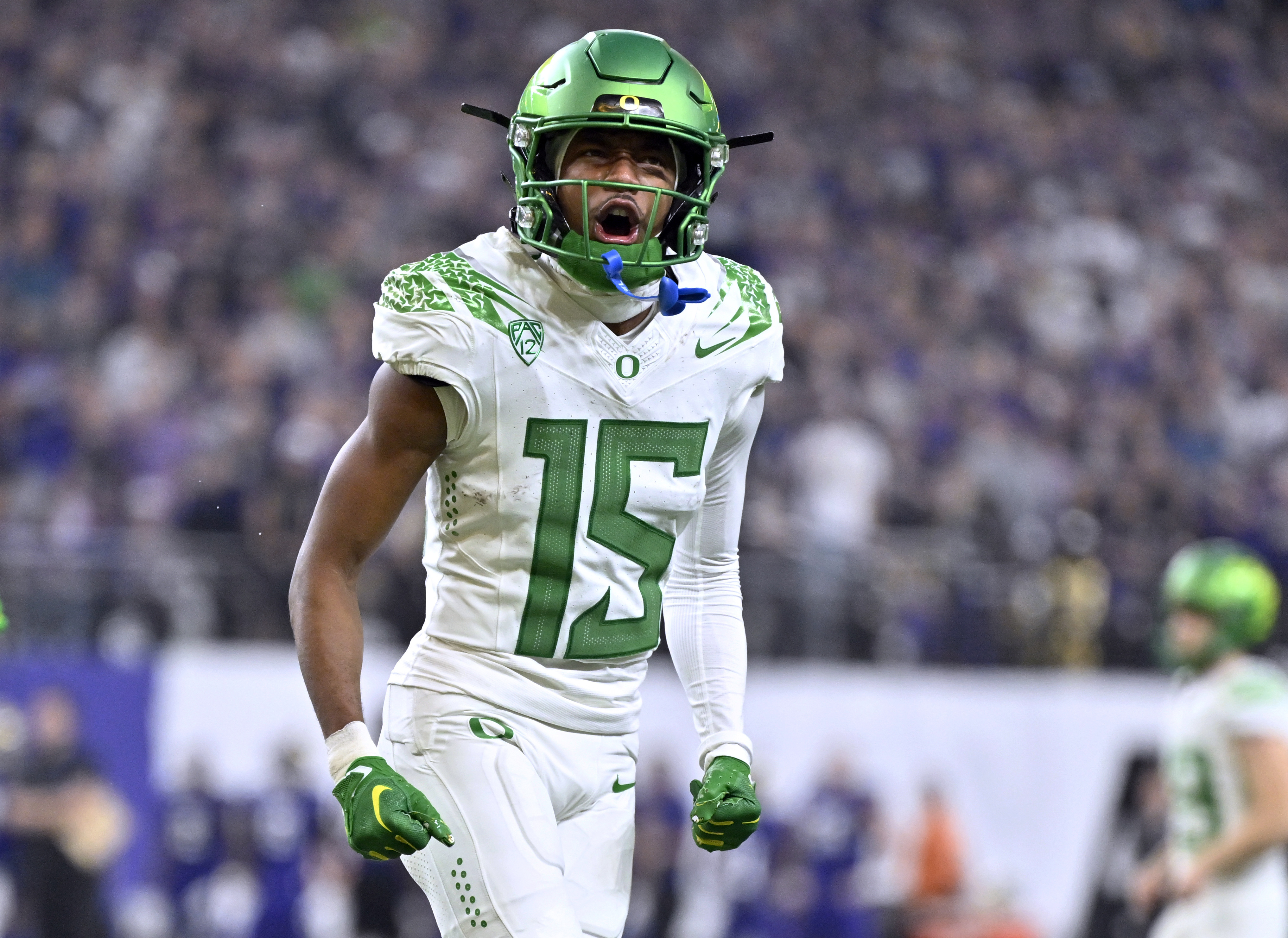 FILE - Oregon wide receiver Tez Johnson reacts after a touchdown against Washington during the second half of the Pac-12 championship NCAA college football game Friday, Dec. 1, 2023, in Las Vegas. 