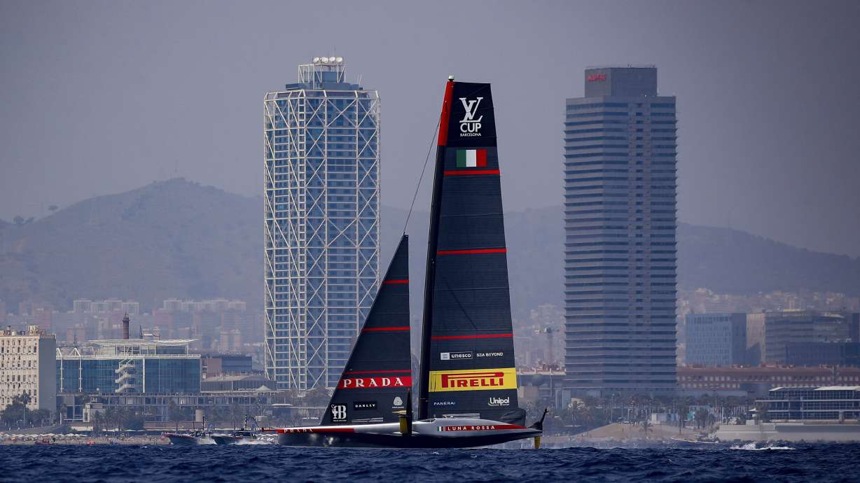 Luna Rosa Prada Pirelli Team's AC75 boat sails during America's Cup Preliminary Regatta ahead of the 37th America's Cup sailing race at the Barcelona's coast, Spain, Thursday, Aug. 22, 2024. The world's oldest international sports trophy, best yachtsmen and cutting-edge design and technology will come together in Barcelona when the 37th edition of the America's Cup starts on Thursday.